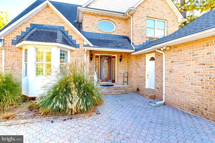 Imagine living where charm meets coastal serenity.
Do you crave the peace and calm of waterfront living — morning coffee by the water, weekends spent boating — but don’t want to give up the character, space, and timeless craftsmanship of a brick colonial? 1432 Shore Rd delivers both.

Nestled in Wilson Point, this home offers the rare balance of a quiet community setting with convenient access to major routes, nearby marinas, and all that Middle River has to offer. This 3-bedroom, 3-bathroom gem features a spacious garage and a versatile exercise room off the first-floor foyer — perfectly positioned near a full bath for added convenience. Enjoy an oversized family room with tranquil water views and a bonus sunroom that opens to your deck and fenced yard, ideal for entertaining or relaxation.

Upstairs, the primary suite impresses with a sitting area overlooking the water, a dual-vanity bath, and a modern walk-in shower. Down the hall, you’ll find upstairs laundry, plus two additional large bedrooms and another full bath. Every detail blends style and convenience, creating a unique combination of luxury brick colonial craftsmanship and waterfront living in a sought-after community.

Move-in ready and thoughtfully designed, this home captures the best of both worlds — classic craftsmanship and coastal charm — set within one of Middle River’s premier waterfront neighborhoods. Welcome home to Shore Rd — come make this unique opportunity yours.