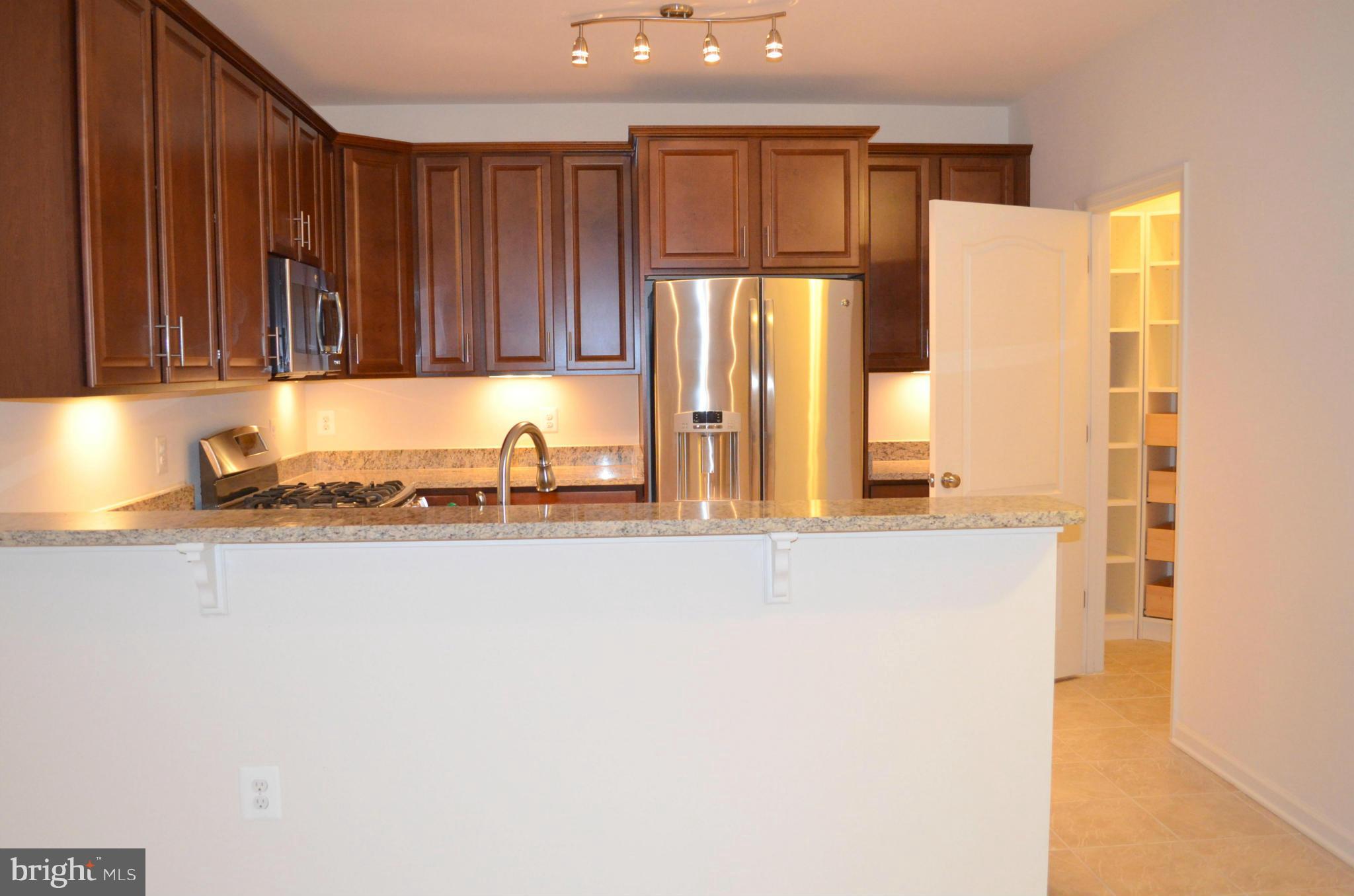 VILLAGES AT BROADLANDS CONDO - Residential