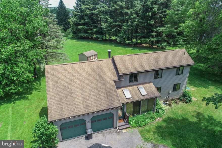 Discover your perfect Deep Creek Lake getaway in the desirable Ridge at Paradise Point community, where breathtaking lake views and incredible amenities await! This charming entry level vacation home offers exclusive access to one of the most stunning shared lakefront areas, featuring a level shoreline, picnic pavilion, ample parking, and easy entry for kayaks, canoes, swimming, and fishing.
Step inside to an open floor plan with soaring vaulted ceilings in the living room, creating a spacious and airy feel. Cozy up by the woodstove on chilly evenings. The main-level primary bedroom provides convenience, while the oversized bathroom includes a washer and dryer. Upstairs, you'll find Bedroom #2, along with a versatile open loft (Bedroom #3), currently accommodating a queen bed. Additionally, there's a potential 4th bedroom (8' x 7'), perfect for a twin bed.
A large back deck and level yard offer great space for entertaining, relaxing, or playing. The two-car garage is ideal for storing all your lake toys, and above it, you'll find a 400 sq. ft. unfinished bonus room, ready for your vision—whether as a game room, guest suite, or studio. With potential for an interior staircase, this space offers exciting possibilities!
Seize this opportunity to make lake life a reality!