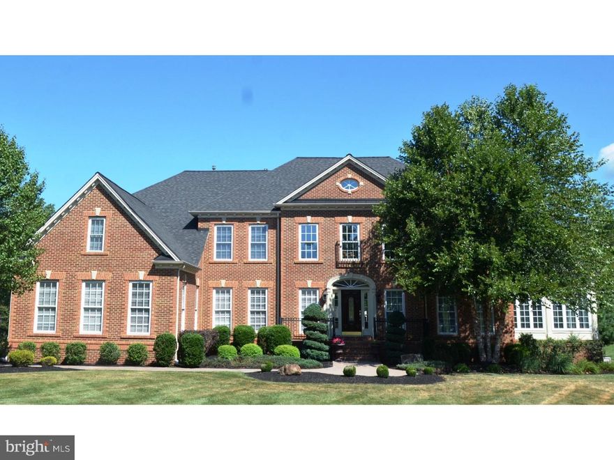 This statement-making estate property is quality from its brick front through to its expansive back paver patio.  It is built with an open floor plan and attention to detail.  The millwork is a major WOW! Enter to a breathtaking two story foyer with gleaming hardwood floors and dramatic stairways and balcony.  The living room is stately and refined and leads to a wonderful conservatory with three walls of windows.  The dining room is perfect for large dinner parties or intimate get-togethers.  The family room is highlighted with a two story boxed ceiling, gas fireplace, and gorgeous built-in cabinetry.  The expansive kitchen has all the amenities you would expect: stainless steel appliances, granite countertops, a large island, an eating area, and much more.  The attached morning room is an inviting place to have your morning coffee.  The office/study offers a quiet sanctuary. On the second floor the master suite is all it should be, with large sitting area, two walk in closets and a huge luxurious bathroom with a walk-in shower and a garden tub.  Also on the second floor are three additional bedrooms each with a full bath. The lower walkout level includes a great room with a stunning gas fireplace, an adjoining game room including a wet bar, dish washer and refrigerator, and a separate theater room.  Completing this level is a fifth bedroom or possible exercise room and another full bath.  Adding to all these amenities is a three car attached garage, Hardie Plank siding, and 2.55 acres of flat, manicured yard backing to private wooded land with views of Pickering Creek in the Winter.  Seller is a licensed Real Estate Agent in PA