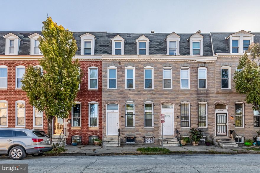 Beautifully updated 3 bedroom home in Station North! Overlooks a lovely park out front. New park being built on the block behind the home. Once inside you are greeted by beautiful hardwood floors that flow throughout the main level of the home. The kitchen has upgraded appliances, cabinets and countertops with a ton of natural light. Upstairs, you'll find two bedrooms and a full bathroom. On the third level, you'll find a third private bedroom. The basement is a large, flex space. DOUBLE PARKING PAD!! Home is a 10 minute walk to Penn Station, MICA and there are several restaurants nearby.