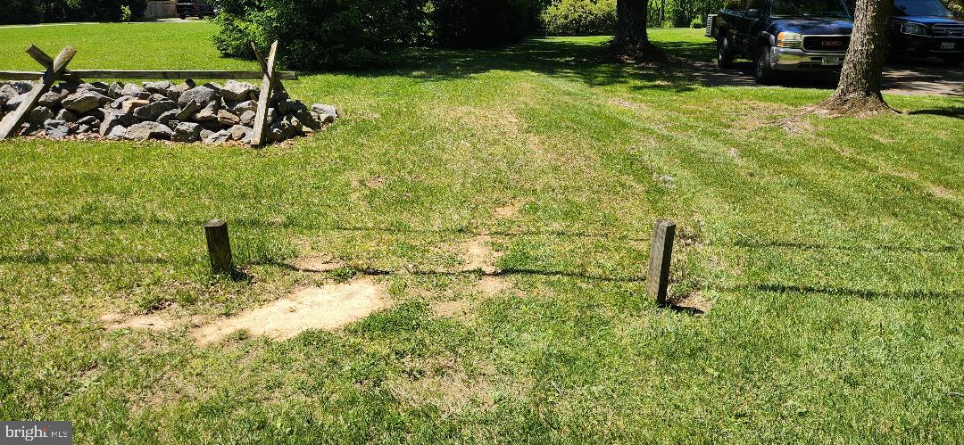 Come take a look at this level lot offering almost a full acre. Land offers a passing Perc test. Enough to build your own home and more. Located off of Little Antietam rd. Lot# P59. Located in a rural setting. Use 13502 Little Antietam dr, Hagerstown MD to locate property, follow sign straight back to tree line. The driveway is undeveloped next to 13502 Little Antietam. Lot is wood but is very secluded for your privacy.