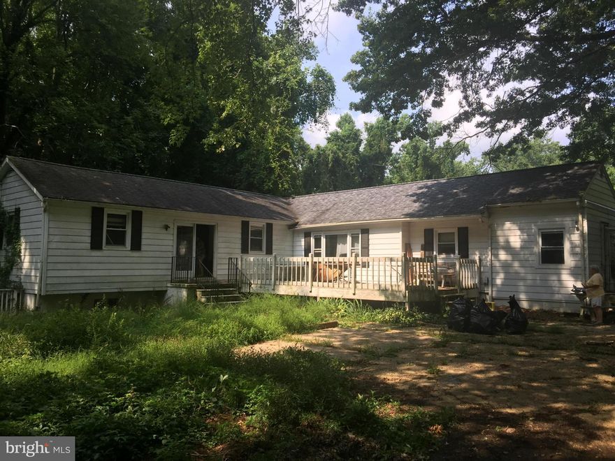 Great location. Secluded lot. Property being sold as is. A little sweat equity can quickly turn this house into a home.