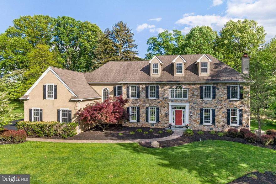 Welcome to this private, 1+ acre property in the exclusive cul-de-sac of Yellow Springs Estates surrounded by beautiful horse farms in Tredyffrin Township.  Built by award winning & main line builder David D’Agostino, this home has been meticulously maintained and offers stunning custom millwork, wainscoting and moldings, beautiful hardwood flooring, two gas fireplaces and an expansive open floor plan perfect for everyday living and entertaining.   Outside, admire the stone and commanding curb appeal.   Inside, this home features a front-to-back foyer with sweeping staircases going both up and down. Beyond the staircase, find french doors leading to a rear yard and patio beyond!  The living room offers a marble hearth and gas fireplace with 4 large windows and recessed lighting. The dining room can hold large dinner parties and features a butler pantry beyond for serving food and bar service.  There is also a first floor office/library tucked away which overlooks the rear corner of property.  The gourmet kitchen is the heart of this home and offers custom Decora cabinetry with a large eat-in island, stainless steel appliances, top of the line GE Profile range/cooktop, double oven & Subzero refridgerator .  A full breakfast room area with sliding doors to fenced rear yard and patio. The adjacent Great Room has a floor-to-ceiling stone fireplace and gorgeous windows. Both formal and informal powder rooms, a mudroom area and attached 3-car garage complete the level of living.  On the second floor,  the main staircase landing offers a large palladium window overlooking rear yard.  The main bedroom suite includes a vaulted ceiling and beautiful window views.   The bathroom suite features a classic tile floor, seamless shower, soaking tub, double vanities and water closet.  The walk-in closet is large and offers plenty of room for both clothing and dressers.  Down the hallway,  find four more generously sized bedrooms two with en suite bathrooms and walk-in closets.   There are two more bedrooms that share a full bath with double vanity.  Additionally, there is a large and convenient second floor laundry room and rear staircase. The lower level is partially finished room with loads of daylight windows, new plank flooring and game closets.   Beyond in the unfinished portion there is plenty of room for exercise, storage and utilities.    This property meets today’s evolving lifestyle standards and is located in one of the most coveted and convenient locations.  Highly ranked T/E Schools, major commuting routes, Valley Forge National Park, Center City Philadelphia, PHL Airport and main line towns are all minutes away.