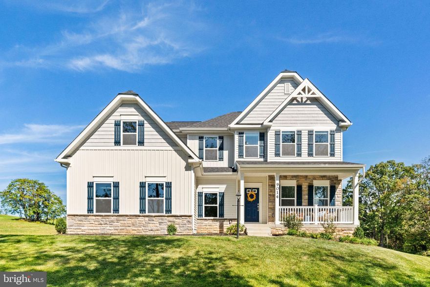 This stunning new construction home, completed in 2024, has never been lived in and it is only 4 miles from town!  Situated on a beautiful 1.46-acre lot, this Maronda built home showcases modern luxury and exceptional craftsmanship throughout. A welcoming covered front porch and spacious 20’ x 10’ composite deck create inviting outdoor spaces to relax and entertain.

Step inside to a bright and elegant living room that flows seamlessly into the impressive family room, featuring a gas fireplace with a dramatic two-story stacked stone hearth, coffered ceiling, and a wall of windows that fill the space with natural light. The gourmet kitchen is a true showpiece, offering abundant cabinetry, a beautiful tile backsplash and a massive island with upgraded quartz countertops. The  high-end stainless steel appliances include a spacious refrigerator, dishwasher, gas cooktop, range hood, and double wall ovens with dual convection, steam cooking, and Wi-Fi connectivity. The light-filled dining area overlooks the backyard, creating the perfect setting for everyday meals or entertaining guests.

A main-level office provides a quiet workspace, and a flex area just off the family room offers endless possibilities.  It's an ideal space for a playroom, homework space, or organized mudroom. Throughout the home, you’ll find upgraded lighting fixtures that add elegance and warmth.

Upstairs is the spacious primary ensuite with a tray ceiling and an amazing spa-inspired bathroom featuring dual vanities, an elegant soaking tub, separate shower, and a huge walk-in closet.  This is truly a retreat of its own. Three additional large bedrooms share a well-appointed full bath, and one bedroom includes a bonus room that’s perfect for a play area, study nook, or creative space.

The walk-out lower level offers even more versatility with a large recreation room, luxurious full bath, and an additional room that could serve as a home office, workout area, media room, or guest suite. There’s also ample storage and sliding glass doors walking directly out to the expansive backyard. 

This is a wonderful home.  Brand new and waiting for it's own family!