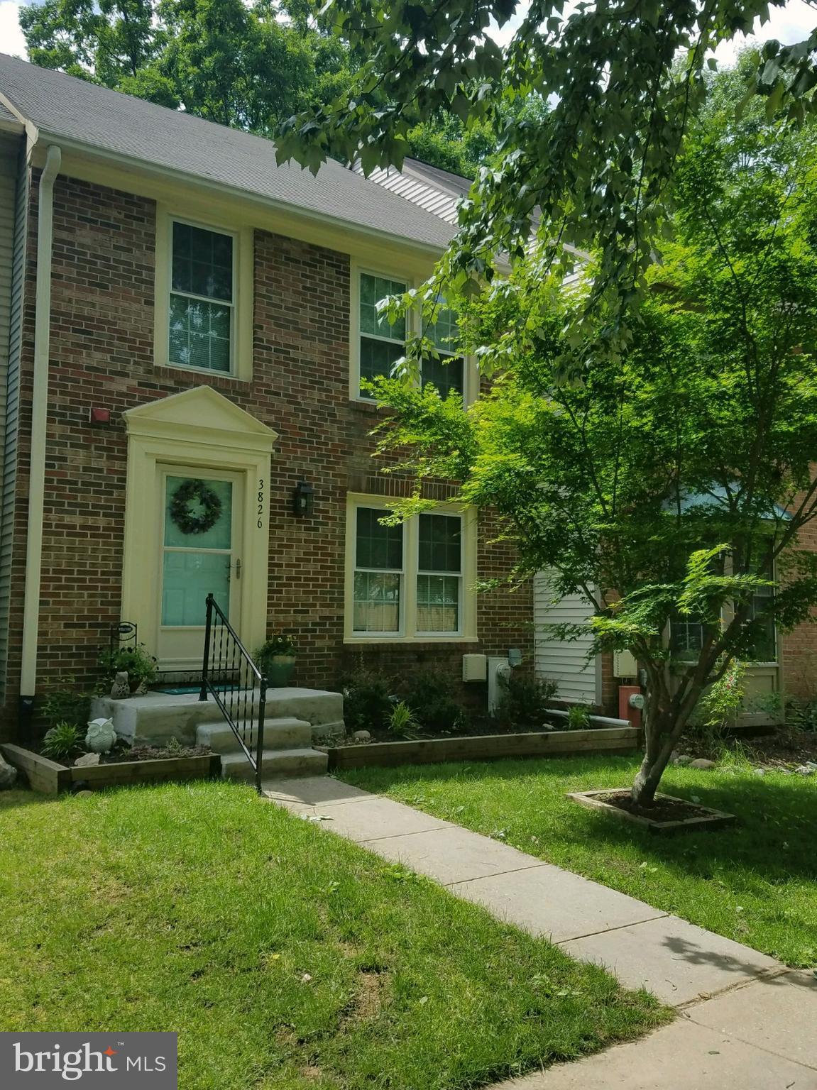 MUST SEE!! Spacious brick townhome boasts wood floors on the main level leading to a brand new kitchen with granite countertops and SS appliances. Each bedroom is attached to its own newly renovated full bathroom. Walk out of the fully finished basement and relax on a large patio within a fenced backyard!