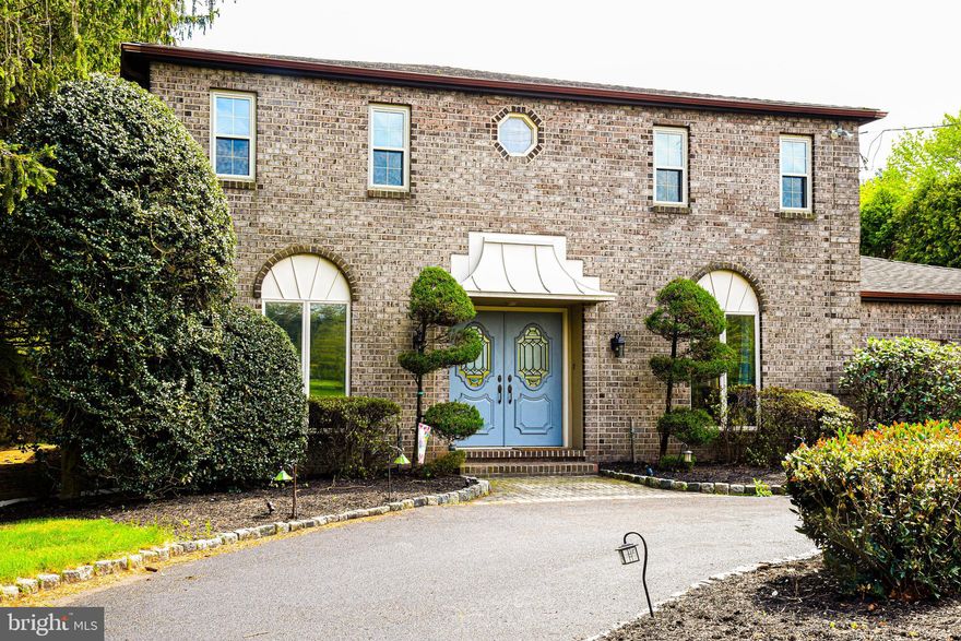 Welcome to this exceptional 4-bedroom, 2.5-bath home located in the highly sought-after Council Rock School District, offering comfort, space, and endless potential. From the moment you arrive, the circular driveway and expansive 4-car garage (2 attached, 2 detached) set the tone for both convenience and impressive curb appeal. The detached garage is further enhanced by a dedicated workshop area and an additional storage shed, making this property ideal for hobbyists, car enthusiasts, or those in need of extra space. Inside, the home unfolds with a warm and inviting layout designed for both everyday living and entertaining. The spacious eat-in kitchen serves as the heart of the home, featuring abundant cabinetry, a pantry for added storage, a stylish backsplash, stainless steel appliances, and enhanced countertop lighting. Sliding glass doors with remote-controlled curtains open seamlessly to the patio, blending indoor comfort with outdoor living. The inviting family room is filled with natural light from stunning skylights and features a cozy fireplace, ceiling fans, and direct access to the patio through sliding doors.  A built-in wet bar makes entertaining effortless, whether hosting movie nights, game days, or casual gatherings with friends and family.  Upstairs, the primary suite provides a private retreat with generous closet space and a spa-like bath featuring a jacuzzi tub, separate shower, bidet, and towel warmer. Additional bedrooms are well-sized and versatile, complemented by an updated full bath with a towel warmer.  A dedicated home office with decorative doors provides a quiet, private setting ideal for remote work or client meetings, ideally positioned just inside the main entrance for added convenience.  A conveniently located first-floor powder room is situated off the laundry area. The walk-out basement expands the home’s versatility, offering endless possibilities as a fitness area, playroom, workspace, additional food prep area, or extended storage—tailored to fit your lifestyle needs. Step outside and discover your own private oasis. The generously sized patio is partially covered and thoughtfully designed with a skylight and ceiling fan, providing a comfortable outdoor retreat even on warmer days. Whether hosting gatherings or enjoying quiet moments, the space is perfectly suited for relaxation. Complete the experience by lounging poolside or unwinding in the jacuzzi, creating a true resort-like atmosphere right at home.
A place to live beautifully, entertain effortlessly, and feel completely at home. Come see this home in person to truly experience everything it has to offer.