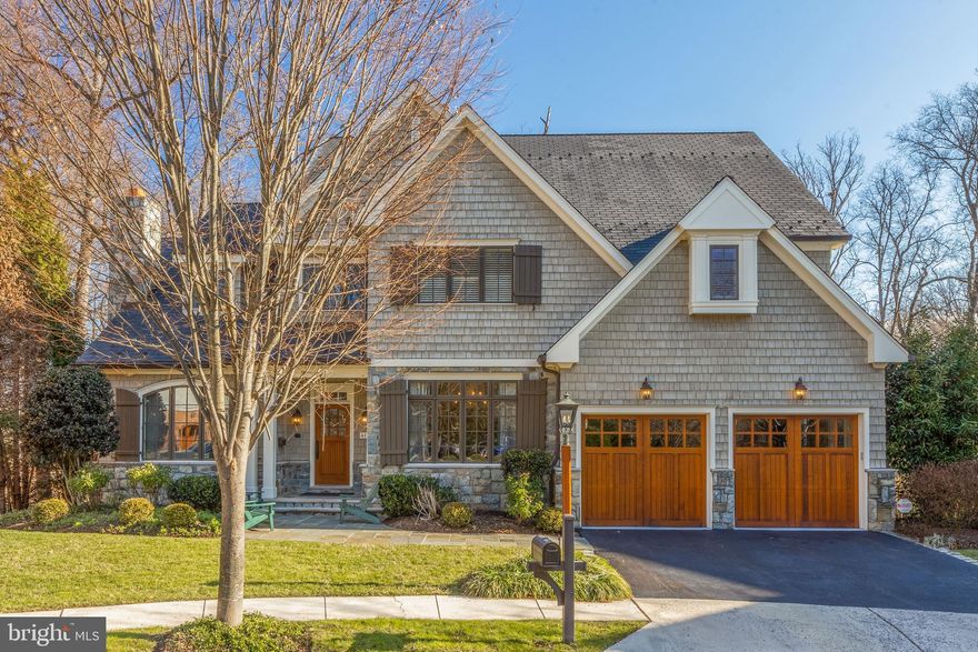 Exquisite!   In a private cul- de -sac  above the Potomac River at Chain Bridge on an 18,000+  square foot private, wooded lot you will find 4115 Randolph Court, one of 6 custom homes built by TJO Company, a renowned local builder known for quality  construction and striking design.  If you are attracted to  a floor plan suited  for  elegant yet comfortable living with tasteful architectural detailing then this is a home you may wish to consider. The tall ceilings and  generous arrival area set the tone for this one of a kind home.  As you enter you will find a proper parlor with a gas fireplace to your left and a  banquet sized formal dining room on your right.  In the rear of the main floor is the chef's caliber kitchen complete with a huge center island, a casual dining area, a catering station.  The kitchen and family room  share a  double -sided gas fireplace. The family room's  rear wall of windows overlooks...nothing but trees!! French doors from the family room  take you to a large private dining deck.   The space and the flow in this part of the home is ever so welcoming...you just want to stay awhile.  The  well-designed and outfitted home office is located in a private corner of the main level.  Take either of two stairways to the second level where you will find an exceptional primary suite that defines the hallmark of fine living.  The secondary bedrooms on this level and there are 3, are all  architecturally distinctive and spacious. On to the 2nd  upper level which houses an additional bedroom and full bath plus a bonus room...office...library... hide away...you name it.  Down to the lower level which has been finished for entertaining (take the ELEVATOR if you wish) . The fitness room is quite spacious, the pool table occupies only some of the space on this level.  There is a large "movie" area plus a bedroom and full bath.   There are many more details that  are sensational aspects of this home.  Simply put 4115 Randolph Court is a magnificent home and one that you need to see in person.