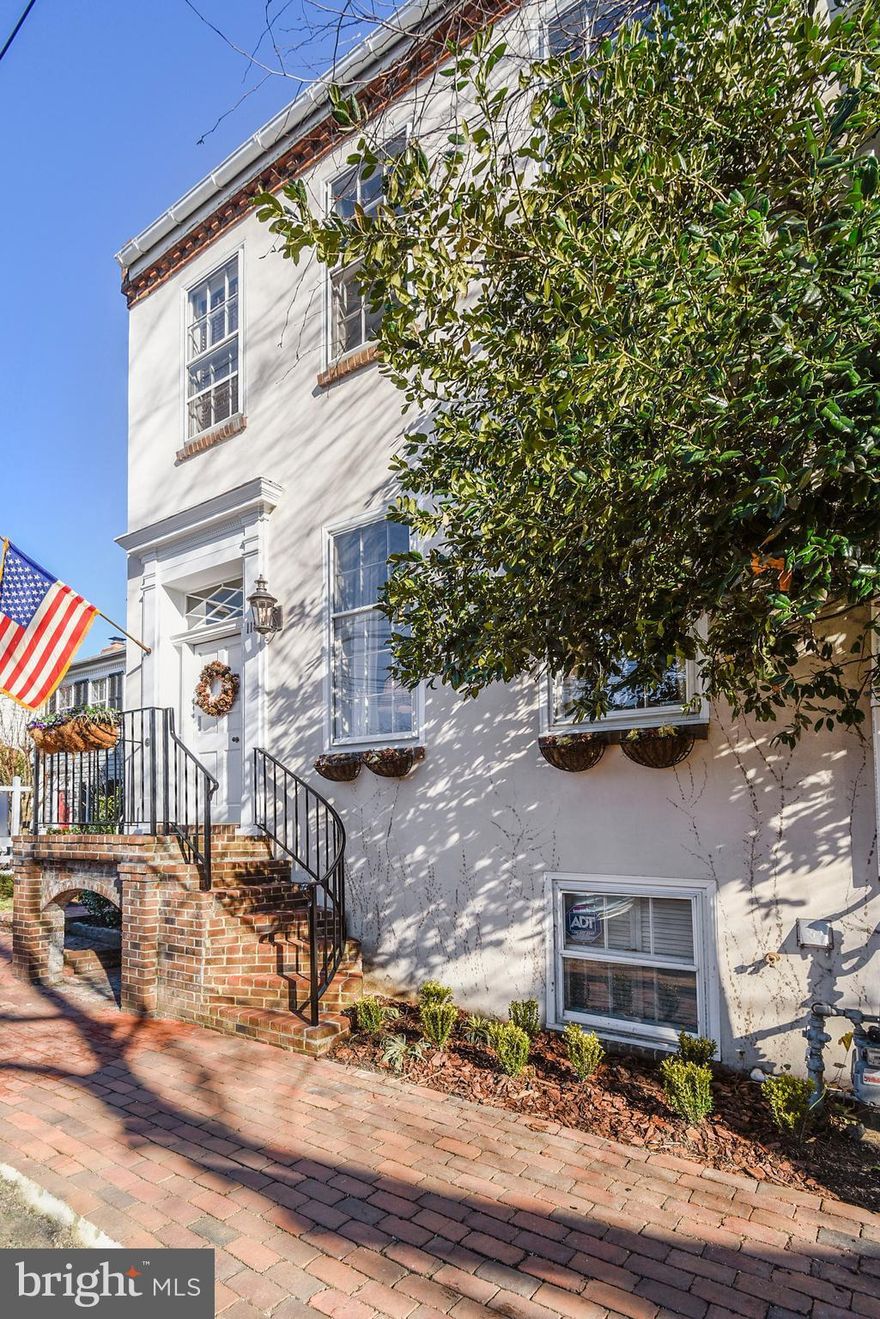 Classic Old Town stunner perfect for entertaining. Chef's kitchen overlooking rear 4-season private garden via floor to ceiling glass. Formal LR & DR, 4BR/3.5BA & English basement apartment w/ brick floor, FP, full KIT, laundry & guest rooms. High ceilings & HWs throughout, 6FPs, tons of storage! 2 OFF STREET spaces. Steps to shops, dining & Metro. See virtual tour & floorplans!