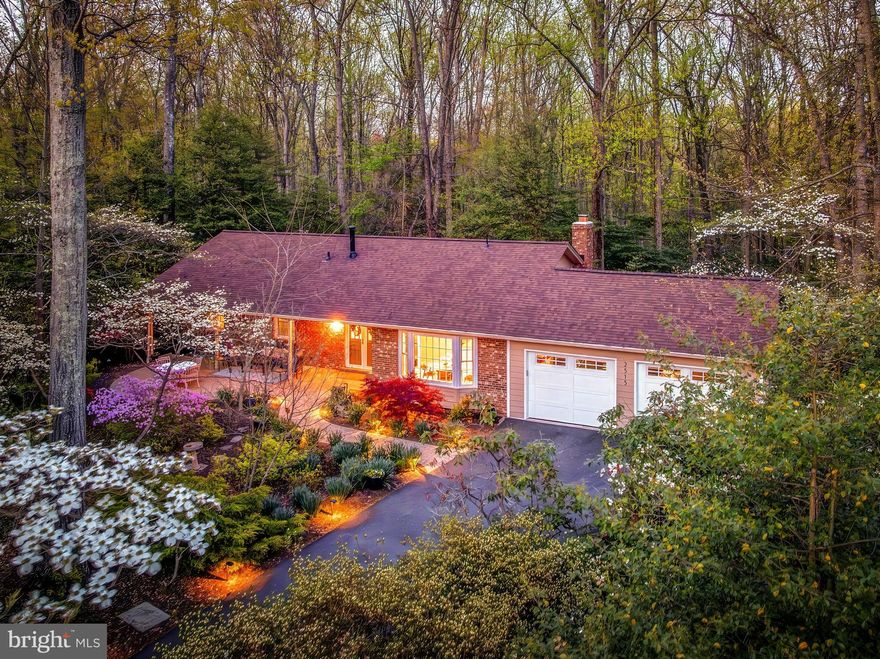 Tucked onto a premium .61-acre wooded lot on a quiet cul-de-sac, this 4-bedroom, 3-bath home at 2515 Fowlers Lane feels like your own private treehouse and we mean that in the best possible way. The main level flows beautifully, starting with a kitchen outfitted with soft-close maple cabinets, granite countertops, stainless appliances, and recessed lighting, all opening into a genuinely large eat-in breakfast area with a beamed ceiling and a bay window bump-out that pulls in the outdoors. The formal dining room off the kitchen has a chandelier that actually earns the word "eye-catching," and the family room is anchored by a massive window that frames the wooded backyard like a painting, it's the kind of view that stops people mid-sentence during a showing. The main level primary bedroom is generous in size with an en suite bath, and two additional bedrooms share a full bath that feels anything but builder-grade. Hardwood floors run throughout the main level with tile in the kitchen. Head downstairs on hardwood stairs, a nice touch, and you'll find beutiful carpet, a huge rec room with a wood-burning brick fireplace, and French doors that walk out to the rear yard. The lower level also has a renovated full bath with walk in shower, a true laundry room with tile floor, built-ins, counters, a sink, and a stackable washer/dryer with its own walkout exit, plus a large guest bedroom and a storage room that will make you genuinely happy. Outside, a gorgeous paver walkway leads to a front patio lined with a beautiful garden that comes alive in summer, and a second paver patio out back gives you another spot to actually enjoy this lot. The two-car garage is no afterthought either, custom RaceDeck flooring, built-in cabinetry, an air compressor with reel connections, and a 220V outlet already wired for an EV charger. The long asphalt driveway fits three cars with ease. Big-ticket items are done: new HVAC in 2026, roof replaced in 2020, windows in 2016. Steps from the home you can hop onto Reston's trail system, 55 miles of paths winding through the community. The metro is 8 minutes away, Dulles is 10, and South Lakes Village Center, Fox Mill, Reston Town Center, and Reston Station cover everything else you need day to day. As part of Reston Association, you also get access to 15 pools, 55 miles of trails, numerous parks, 4 beautiful lakes, 52 tennis courts, 18 pickle ball courts, a variety of community events and programs throughout the year, including festivals, concerts, workshops, and social gatherings, several community centers, including the Reston Association's main headquarters, the Walker Nature Center, and the Lake House at Lake Newport, which offer spaces for community meetings, classes, and special events.