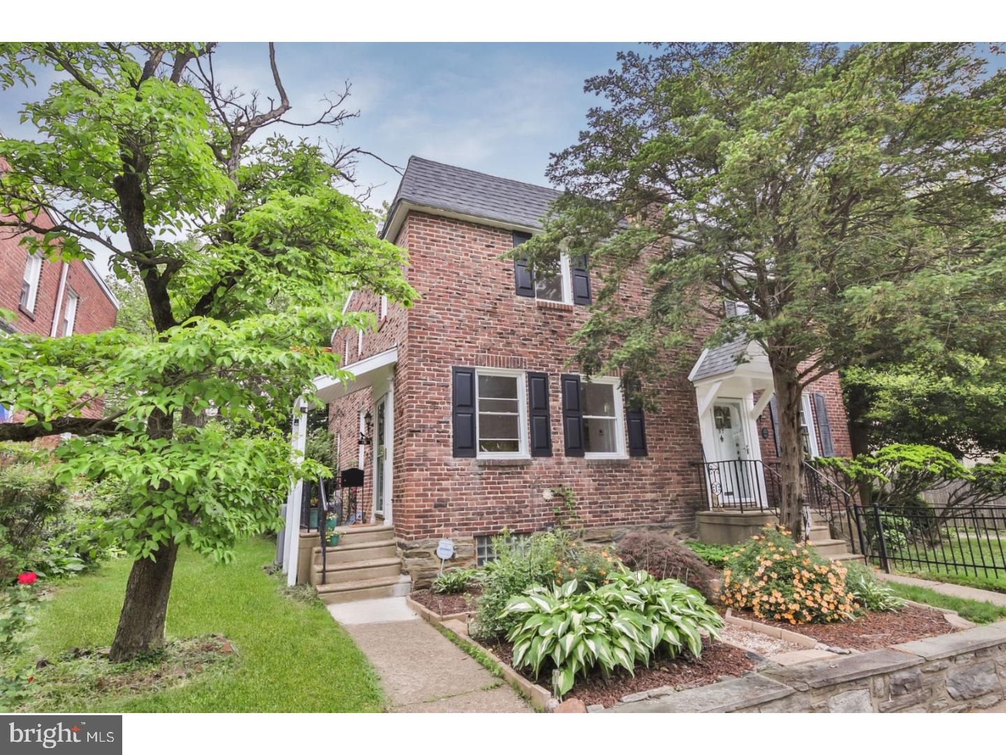 This charming 3 bedroom, 1.5 bath brick twin with central air is located on a quiet street in the heart of Chestnut Hill. Just a block from the many wonderful shops and restaurants of Germantown Avenue and just two blocks from the train station, it makes for an easy walk to most things and an easy commute into Center City. Enter into a spacious open concept living/dining room with freshly refinished hardwood parquet floors. The kitchen has plenty of cabinet and counter space and could easily be opened into the dining room if the next buyer wishes. Kitchen opens onto a large backyard and patio offering the perfect place to sit an enjoy a meal al fresco or for outdoor entertaining. The basement is finished and comes complete with a powder room, separate storage space and laundry. Schedule a showing today! A move-in ready home in the heart of Chestnut Hill at this price point is a rare find!