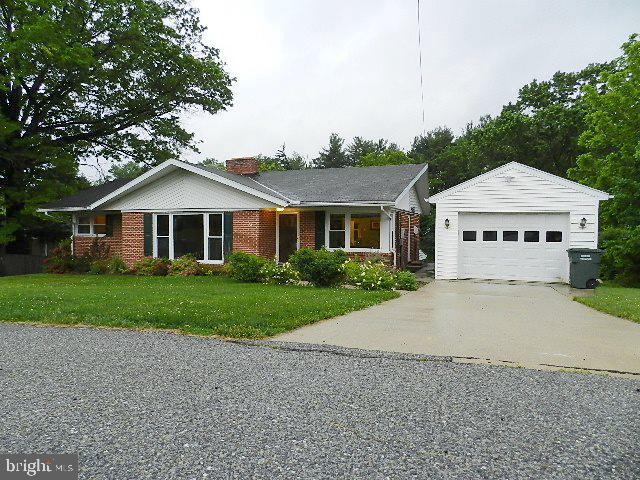 Terrific Rancher with a walk out basement on almost on acre lot. Featuring: Det. garage, off street parking, covered patio, shed w/ elec, fenced yard, stream and backs up to a Golf Course. 3 Bed Rms, Living Rm & Rec Rm each featuring a fireplace w/ gas log insert. Hardwood, laminate and ceramic tile flooring. Minutes to RT74, RT30 & all conveniences. A Must see!
