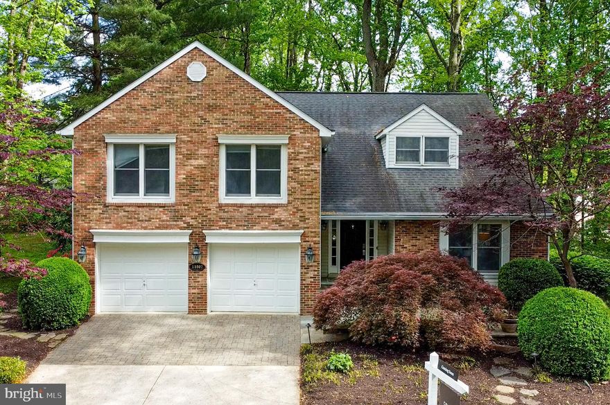 A Picture-Perfect Colonial in Hickory Ridge

Nestled in a serene cul-de-sac on a spacious 0.28-acre corner lot, this stunning 3,416 sq. ft. brick-front colonial built by Columbia Builders offers the ideal blend of comfort, style, and functionality in the sought-after Village of Hickory Ridge.  Low maintenance landscaping on all 4 sides with beautiful springtime and fall colors.

Step inside to find freshly painted interiors, a welcoming formal living room, and an elegant dining room with rich hardwood Bamboo flooring through LR, DR, FR and upstairs and downstairs hallways. A beautiful sunroom including a gas fireplace and vaulted ceiling, overlooking the lush backyard and a wintertime view of Middle Patuxent River from the elevated deck, provides the perfect space for both working from home and entertaining guests.

At the heart of the home, the remodeled kitchen shines with granite countertops, a custom tile backsplash, cherry cabinetry, and stainless steel appliances. The adjoining breakfast room opens to a spacious deck, making outdoor dining a breeze.

The inviting family room features a brick-surround Harman pellet fireplace, custom cabinetry and French doors leading to the sunroom that open to the two-tiered deck.

Upstairs, the owner’s suite is a true retreat, boasting a sitting area, a raised sleeping space, a cathedral ceiling, and 2 walk-in closets. The luxurious en-suite bath showcases a double vanity, statement ceramic finishes, a separate shower, and a corner soaking tub with jet sprays for ultimate relaxation.

The finished lower level adds even more living space, with a convenient walkout to the backyard, perfect for additional recreation or entertaining.

This exceptional home invites you to move right in and make it yours—welcome home!

Anderson Windows
New Heating and AC System replaced by Constellation Home on 4/13/2023 (Free Labor Protection coverage until 4/13/2028)
New Roof replaced in June 2018 by Columbia Roofing (Lifetime Shingle Warranty) 
New motor for Jet Bath
Upgraded Oven, Refrigerator, Dish Washer, and Kitchen Cabinet Hardware