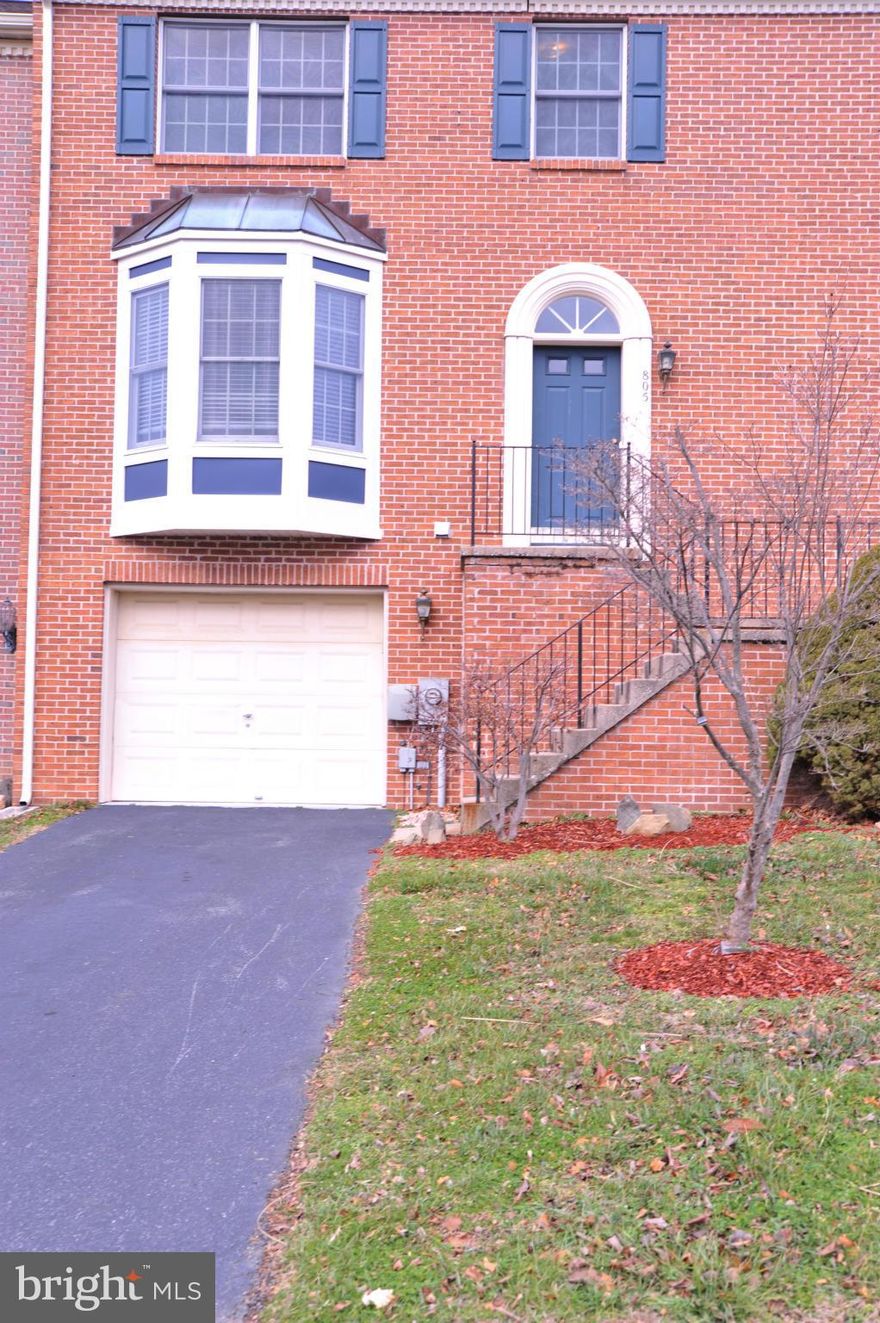 Pristine condition! Brick front with garage! Very clean, freshly painted!  Backs to trees! Plenty of parking ! Tot lot Nearbyt! Available immediately!