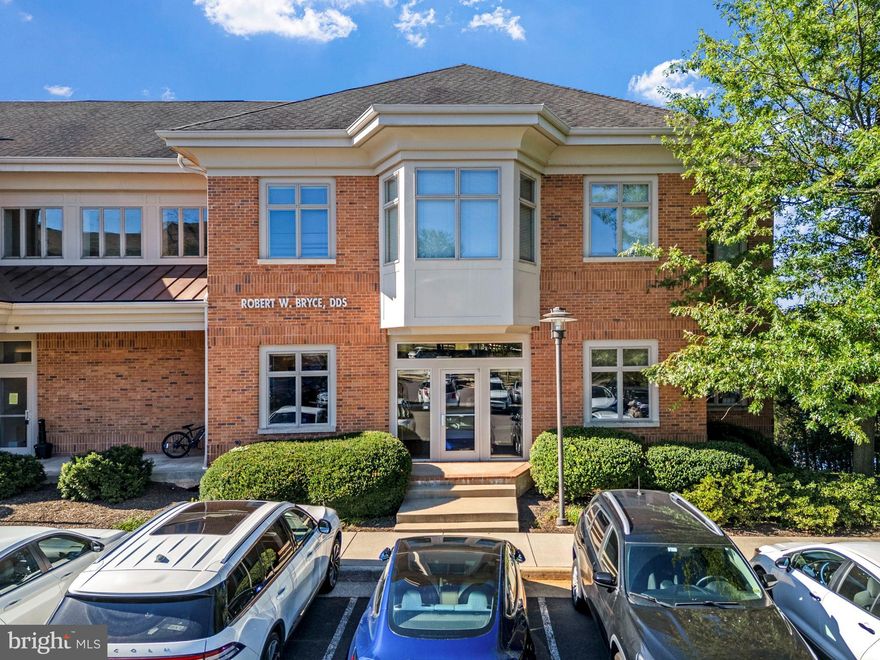 This exceptional commercial property, located within the esteemed Potomac Falls Professional Center, offers a unique opportunity for discerning buyers seeking a tranquil environment enhanced by natural water features. Constructed in 2003 with durable brick materials, the building is designed to provide a professional atmosphere while benefiting from the serene presence of a nearby pond. The property's strategic positioning allows for picturesque views and a calming ambiance, ideal for fostering productivity and creativity. The surrounding landscape is complemented by the soothing sounds of water, creating an inviting setting for both clients and employees. Ample parking is available, ensuring convenience for visitors. The property is not only a sound investment but also a potential haven for businesses looking to establish a presence in a peaceful yet accessible location. This listing represents a rare opportunity to acquire a property that harmonizes professional functionality with the tranquility of nature.