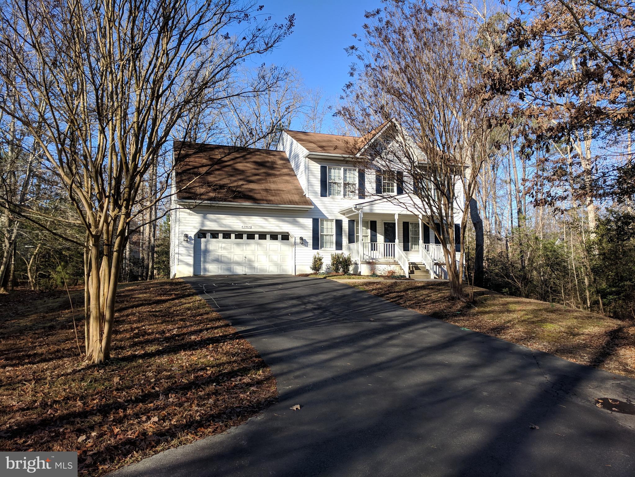 ABSOLUTELY BEAUTIFUL 2 STORY IN WILDEWOOD NESTLED ON A RARE .49 ACRE LOT WITH MATURE TREES. MANY RECENT UPDATES BRING THIS HOUSE INTO 2019; FRESH PAINT, CARPET AND WOOD FLOORS. GRANITE COUNTERS, WHITE CABINETS AND LOVELY BUTLER'S PANTRY WITH WALK-IN PANTRY. NATURAL GAS FIREPLACE WARMS THE SUNKEN LIVING ROOM AND A FORMAL DINING ROOM TOP IT OFF. FRESHLY REMODELED HALF BATH AND GOOD SIZE BREAKFAST ROOM. SLIDING GLASS DOORS LEAD YOU TO THE SCREENED PORCH AND DECK. LARGE OWNERS SUITE WITH WALK-IN CLOSET ANDELUXE BATH FEATURING SOAKING TUB, SEPARATE SHOWER AND DOUBLE VANITIES. FULLY FINISHED WALK-OUT BASEMENT HAS LARGE REC ROOM, BEDROOM, HUGE LAUNDRY ROOM WITH SPACE FOR CRAFTS AND A FULL BATH. GREAT HOUSE THAT YOU MUST SEE!