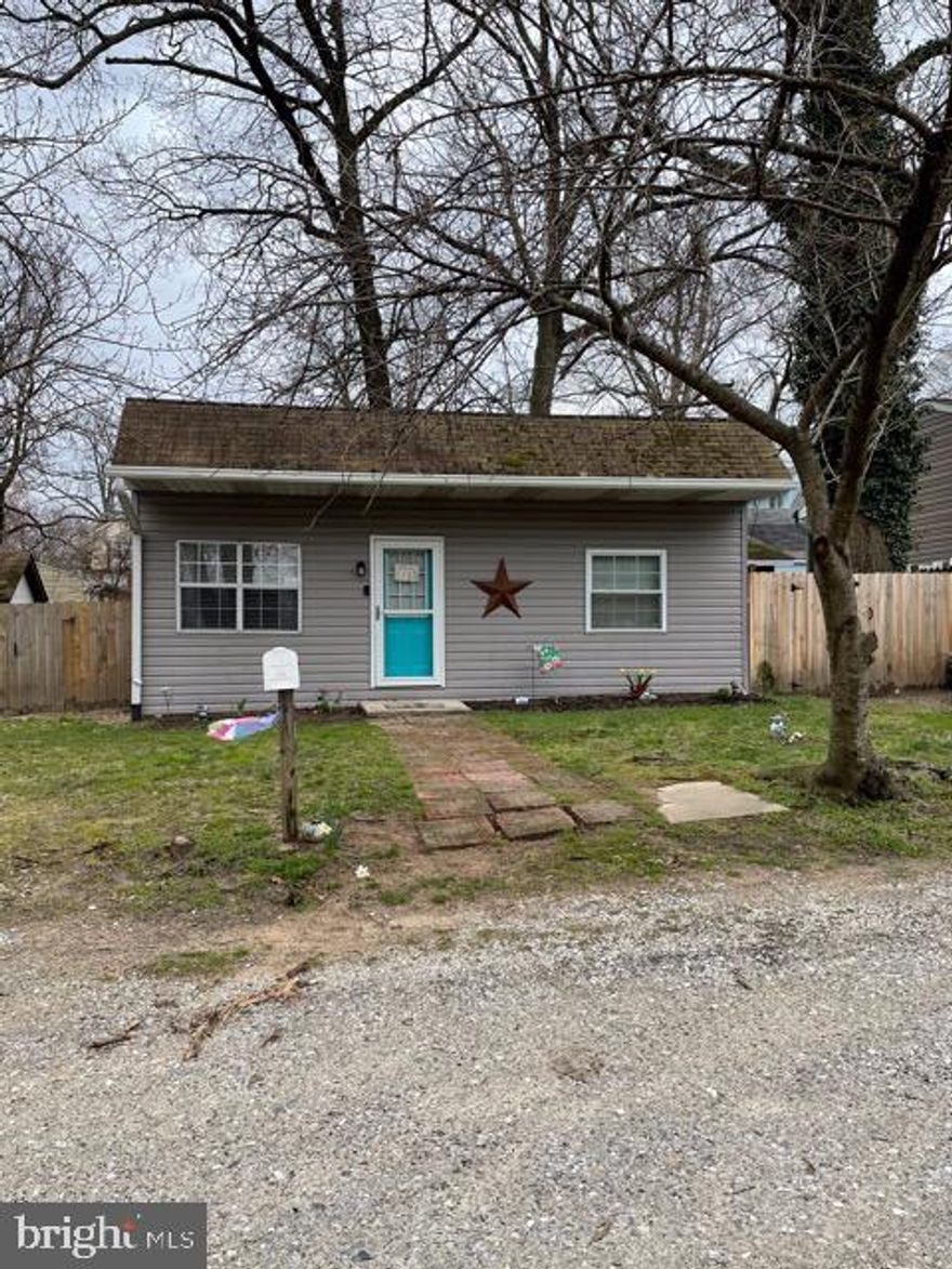 Must have appointment to show and please give at least one hour notice. Extremely cute Rancher/Cottage style home in the Green Haven neighborhood of Pasadena. which is just minutes to water access. This home boasts an upgraded kitchen, 2 full baths, and a large fully fenced in yard with a deck that is great for entertaining. The lower level is fully finished with new flooring that makes the home feel bigger than it is. The wood burning stove in the basement will heat the entire home in the winter and has a built in fan that brings heat to the entire home.