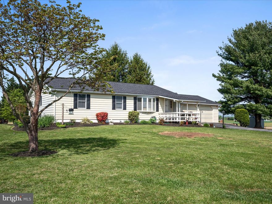 Welcome to 281 Olympic Drive, a charming 3-bedroom, 2-bathroom ranch-style home with a full unfinished basement located in Martinsburg, WV, and has no HOA. Situated on almost an acre of land, it offers peaceful country living with a convenient location close to Shepherdstown.
A newly renovated front porch provides a lovely spot to relax and enjoy the outdoors. Inside, you'll find a living room featuring a large bay window that fills the space with natural light. The galley kitchen is equipped with new appliances and leads to a spacious dining room, which also boasts a larger bay window at the back. The expansive family room is perfect for gatherings and entertaining. Downstairs is a full, unfinished, walk out level basement waiting for your finishing touches.
The home has been recently updated, with new LVP flooring throughout and freshly carpeted bedrooms for added comfort. Recent renovations include a hot water heater (2022), an HVAC system (2024), and a brand new roof (2024). The washer and dryer were just purchased in January 2025.
Additionally, the property features an oversized 2-car garage with a workshop in the back and an extended driveway that allows for extra parking space. 
Schedule your showing today and make this move-in-ready home yours!