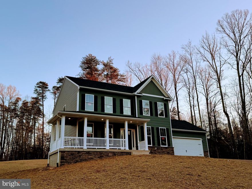 *BUILDER IS OFFERING A 2/1 INTEREST RATE BUY DOWN PROGRAM for approved buyers! See flyer in documents.* Welcome to your forever home, available mid January.   This 4 bedroom Haven by award-winning builder Foundation Homes offers a perfect blend of traditional colonial and craftsman style elements.
Step inside from the welcoming front porch into a lovely foyer, flanked by a private flex room with double doors and a spacious dining room leading to the gourmet kitchen. Equipped with high quality shaker-style, white  soft close cabinets, stainless steel appliances, quartz countertops, and a large under-mount stainless sink, this kitchen makes cooking a delight, and the large island leaves plenty of room for eating and gathering. The seamless flow into the eating area, family room , and sun room is illuminated by an abundance of natural light.  The main level features 9-foot smooth ceilings and waterproof luxury vinyl tile, ideal for active families.  Hardwood stairs lead to the second floor, where you'll find all 4 bedrooms and a convenient laundry room.  This beautiful home has a great upstairs floor plan; the owner's suite  boasts 2 walk-in closets, a linen closet, and a gorgeous en suite bathroom with double vanities, a soaking tub, and a tile shower. The additional 3 bedrooms provide ample closet space. The  unfinished basement  s offers plenty of storage for holiday and keepsake items, with the potential for future expansion.  A 12 x 12 composite deck will overlook the backyard that backs up to woods, providing the tranquility everyone desires. This home will be a stately  grey with regal stone accenting just below the windows, and is located in the sought after Pipe Run subdivision, which is conveniently close to shopping, Route 1,  I-95, downtown, Central Park, Rt 17,  GEICO, and only 15 minutes from the Fredericksburg VRE/Train Station.  Don't miss out on this incredible opportunity – make this home yours today!   ***Pictures in listing are examples of the home that is under construction.