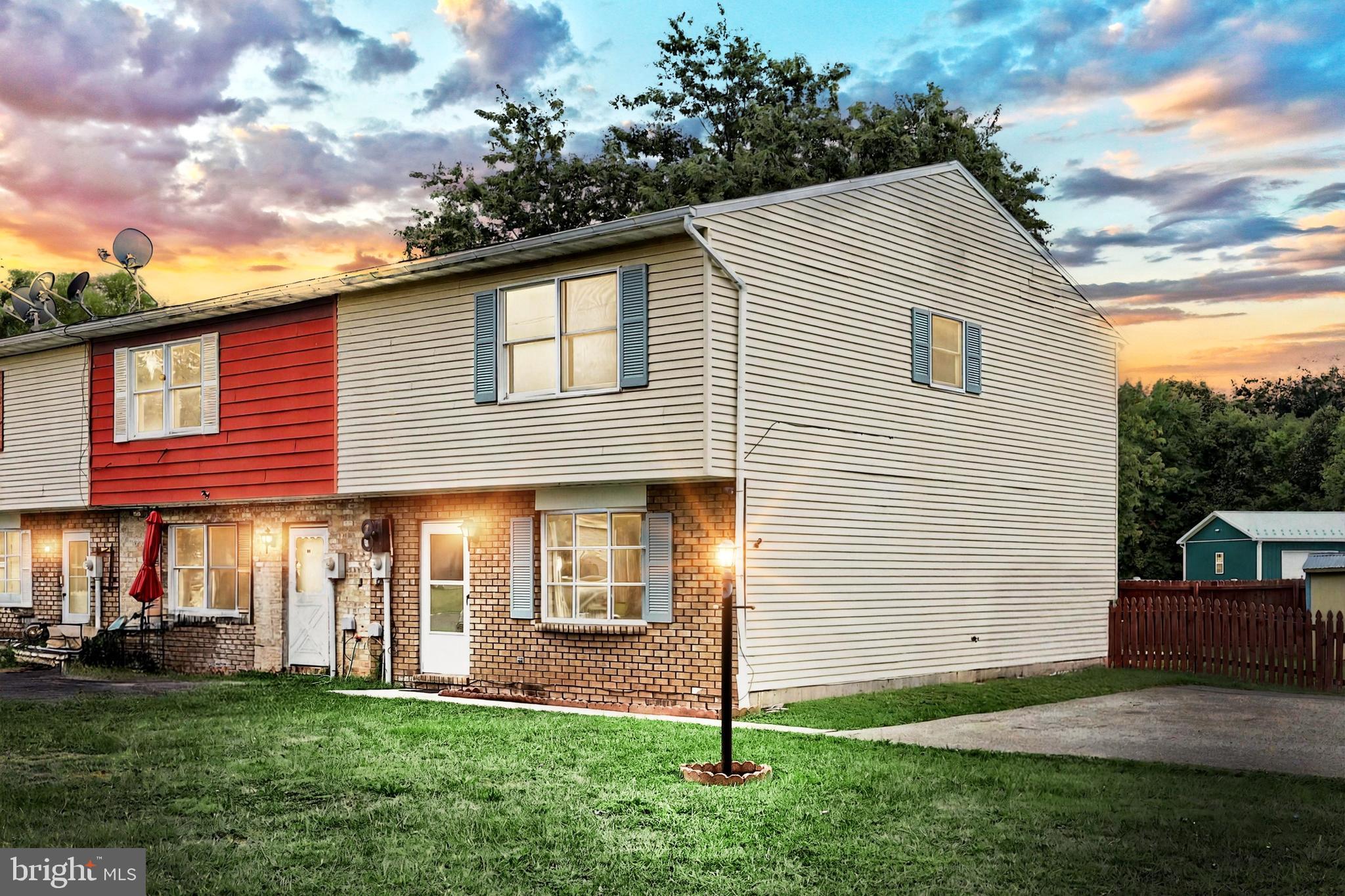 End Unit Townhome with a One Year Home Warranty! Step into this 3 bed, 1 bath townhome with a main level laundry space and see the potential it holds—whether you’re ready to make the move from renting to homeownership or looking to add to your investment portfolio! Offering comfortable living with updates including NEW flooring throughout (2020), NEW fresh paint (2020), and a brand-NEW hot water heater (2025). Enjoy the convenience of off-street parking, a fenced-in yard for outdoor enjoyment, and the peace of mind that comes with a One-Year Home Warranty provided by the seller. This home is a wonderful opportunity waiting for its next chapter!