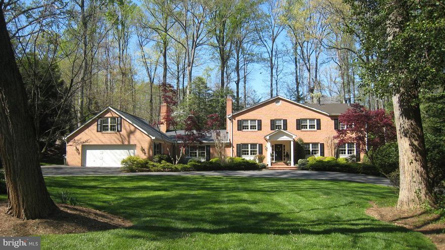 Stunning All Brick Colonial on Cul de Sac in Olde Swinks Mill Estates - Gorgeous NEW kitchen * Private Master Suite with sittingroom,fireplace and balcony overlooking pool* Separate au pair/in-law suite* Main level bedroom/bath* Huge sun room* Library or Home Office w/fireplace* Premium location in one of McLean's most sought-after neighborhoods. An Extraordinary Value!