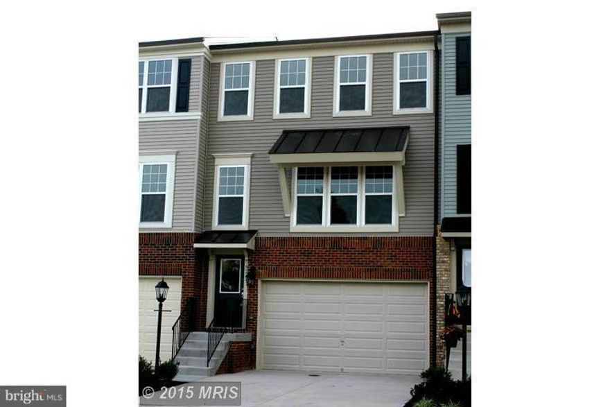 GORGEOUS townhome in Dawkins Ridge.You'll love the open floorplan, espresso wood floors on main level, upgraded kitchen cabinets, granite, SS appliances, large pantry, fully finished lower level walkout, bedroom level laundry, deck, 2 car garage.Minutes to VRE, 1-66 & Rt. 234, schools, shopping, restaurants,Freedom Center and more. Gorgeous and move in ready!