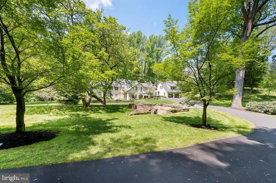Tucked away down a lovely long driveway in Wyndmoor you will find one of the area's finest treasures. The original carriage house, built in 1870, is beautifully sited on 2 separate parcels, 1.70 acres and 1.89 acres, adjoining the Wharton Sinkler Estate. Multiple additions over many years, the property offers 5600+ square feet on two floors in the main house and an additional 900 square foot apartment or office with full bath above the charming detached garage. The current owners have loved and enjoyed this wonderful house for over 40 years. Most recently, completed over the last 13 years, you will find thoughtful additions and outdoor spaces. Love to cook and entertain? This one is made for you. The first floor offers Great Room with fireplace, large Game Room with generous well appointed butlers pantry, office, and two bedrooms with ensuite baths. Upstairs kitchen with large granite island, stainless appliances, mudroom, laundry and full powder room. On either side of the kitchen you will find a family room with fireplace to die for. Large formal dining room Hardwood floors throughout. Two car detached garage with apartment above. Three additional bedrooms with hall bath. Looking for the utmost privacy just a short walk to Chestnut Hill shops, restaurants, Spas, salons, schools, transportation, trails and world class fitness and sporting options? This one is made for you.