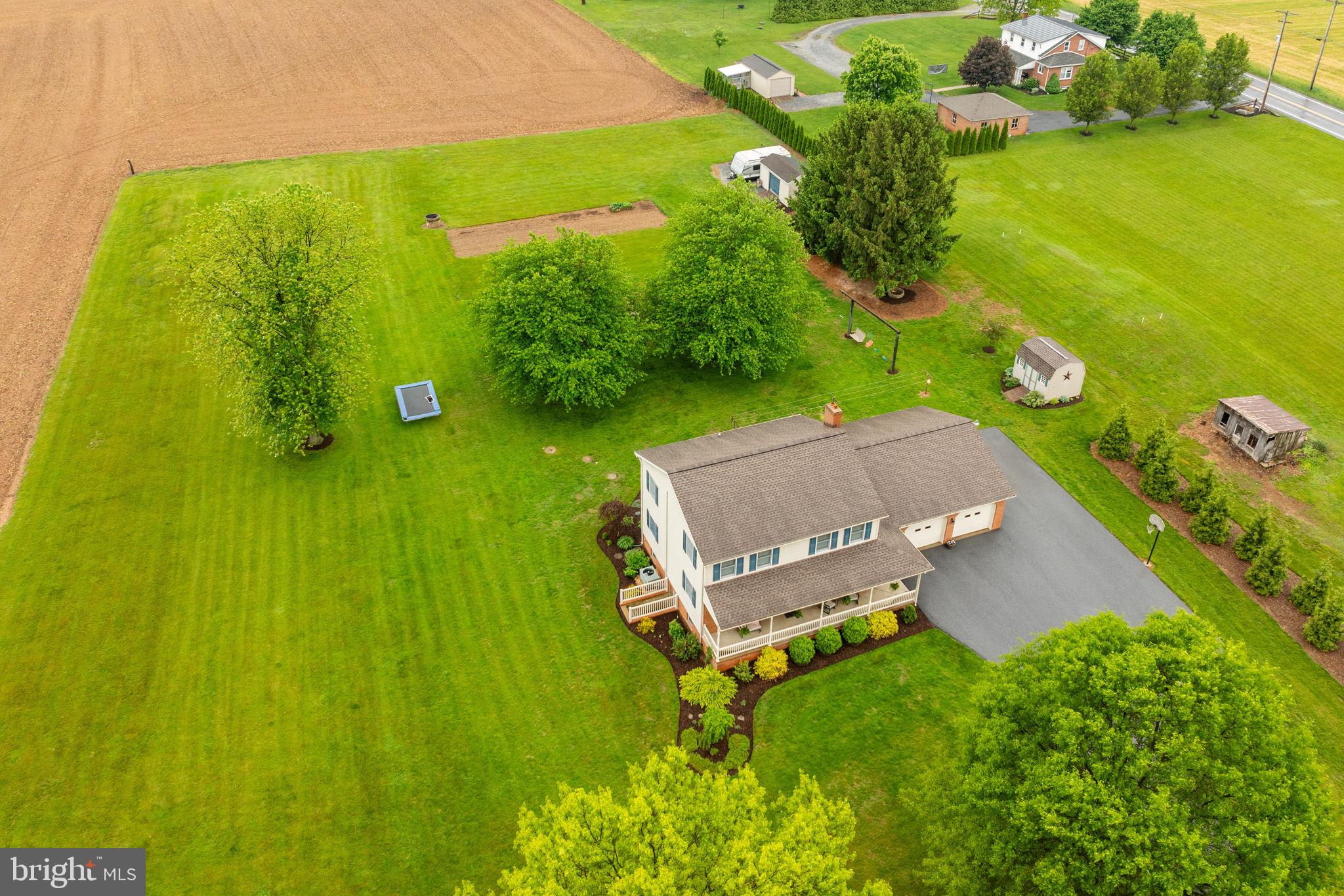 AUCTION DATE - THURSDAY, SEPTEMBER 4, 2025, AT 5 PM. LISTED PRICE IS AN OPENING BID ONLY AND IS NOT INDICATIVE OF THE FINAL SALE PRICE. REAL ESTATE: Custom 2-story brick/vinyl one-owner house w/2850 SF finished area, eat-in kitchen w/custom painted cabinets, appliances & sliding patio doors to rear deck, living room, family/sewing room, office, 4 bedrooms, 2 full baths, 1st floor laundry/mudroom, full basement w/large family/rec. room, utility room, oil baseboard heat, central AC, Colonial trim & panel doors thru out, Anderson insulated windows, covered front porch, large attached 2 car garage & (2) utility sheds 20x12 & 12x10 all on level 2.1 ACRE rural country lot w/farmland boundary, large rear lawn area, garden area, mature shade, professional landscaping, on-site well & septic, low traffic road. Zoned Ag. NOTE: Ideally located custom one-owner house w/spacious rooms. Clean, well-maintained house in move-in condition. Convenient location, minutes to Reinholds, Denver & Schoeneck w/easy access to Rts. 897 & 419. Terms 10% down, balance 60 days or before. Personal inspection by appointment or open house Sat., August 16, 23 & 30 from 1 to 4 PM.