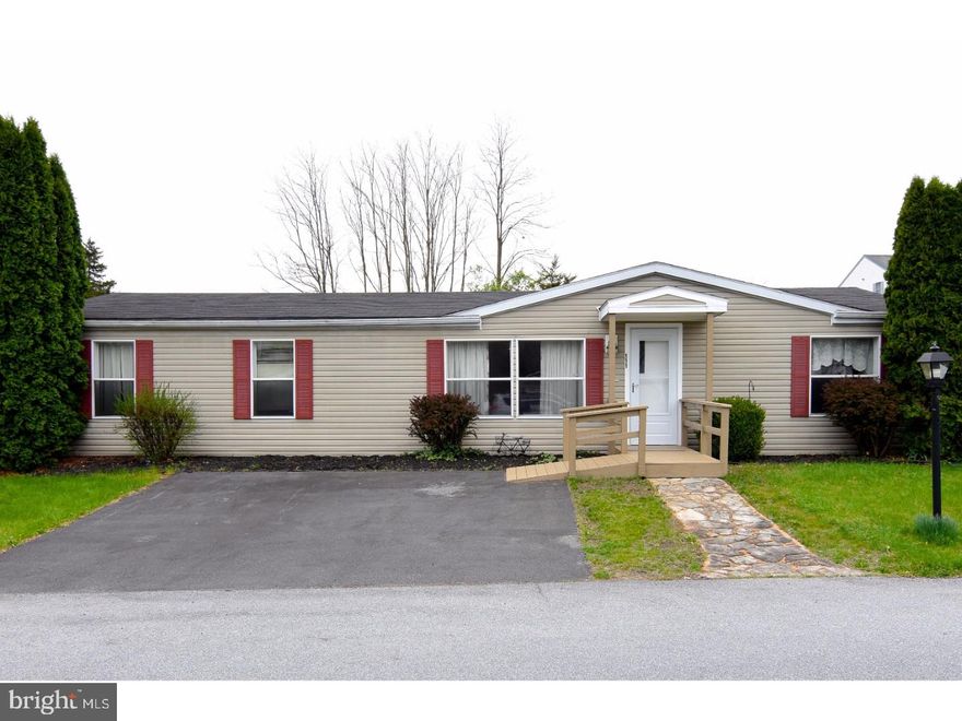 Wheelchair-accessible, manufactured home in the ever-popular Heister's Creek subdivision in Exeter Township and the Exeter School District.  This completely updated, one-story home has a wheelchair accessible ramp leading up to the front door.  The entire interior has been recently painted in earth tones and neutral colors.  The main living room and adjoining family rooms are large enough to accommodate a formal LR and DR suit with recently added Pergo hardwood-look laminate flooring.  The eat-in kitchen is bright and spacious, and the cabinetry and countertops have been conveniently lowered for a wheelchair-bound individual.  Cabinetry is oak & the countertops are Corian w/a moulded sink. All appliances remain, with newly installed vinyl flooring.  All doorways are wide enough for wheelchair entry.  The master bedroom has its own private full bath & walk-in closet.  There are two additional bedrooms that are a very nice size w/neutral wall-to-wall carpeting and share a recently remodeled second full bath.  There is a brand new sliding glass door to the spacious rear pressure-treated deck and the storage shed does remain.  The roof is only a few years old and the HVAC has been professionally maintained. This is easy, affordable one-floor living at its finest!