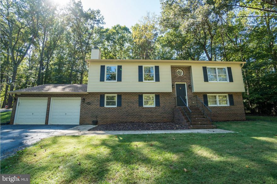 Lovely well-maintained family home in Lake Wilderness. Enjoy the quiet tranquility of the nearby historic Wilderness Battlefield. Escape the stressors of NOVA here, only 16.7 miles to the Fredericksburg VRE, approximately 15 miles to I95 and Central Park! Love where you live and live where you play. Lake Wilderness offers a Clubhouse, Pool, Seasonal Snack Bar, Basketball Court, Tennis Court, Pavilion, Beach/volleyball, Campground, 2 Playgrounds, Picnic area, and 3 Beautiful Lakes! Look forward to coming home and winding down in your own little oasis. Kitchen is ready with Brand New Stainless Steel Appliances.  Living Room upstairs is just off the kitchen, easy to entertain!  Large Composite Rear Deck overlooks large tranquil back yard bounded by mature trees! Huge Family Room downstairs suits for playing and relaxing, and warming in front of Gas Fireplace this winter!  Storage Room can be an exercise room, or whatever you wish!  There's a new energy efficient Washer and Dryer. Store your Toys in a Gladiator Garage Wall System, enclosed by insulated Garage Doors. Brand New super-quiet Garage Door Opener lowers doors onto Industrial Grade Epoxy Garage Flooring. Home has a New Roof and New Certainteed Monogram Siding. Freshly Painted in tasteful colors, also features Newer Carpet, New Hot Water Heater, a 10-yr old Trane HVAC serviced by Garrnett Heating and Plumbing 2x annually.  Water Piping is new Pex Plumbing.  Make it your own!