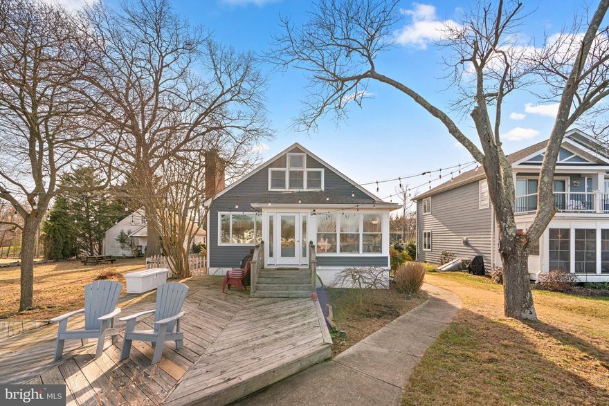This gorgeous  move-in-ready three-bedroom, three-full-bath home is a rare find. Enjoy the serenity of living close to the water, with MLW depth of 8+ feet, deep water that is perfect for boaters. This home features an Open concept kitchen with White Shaker cabinets, granite counters, hardwood floors, stainless steel appliances and center island. Primary bedroom with fantastic water views and walk in closet adjacent to separate ensuite bathroom complete with luxury shower and double vanity. Fully finished lower level with additional bedroom, full bath, living room and additional storage. The roof and siding were replaced in 2015, with the HOOT septic system replaced in 2012. Detached 2 car garage with parking area. Exterior storage shed Level yard, No HOA, No flood insurance due to elevation.  Embrace the perfect blend of comfort and coastal living. Seize the opportunity to make this your new home sweet home! A must see!