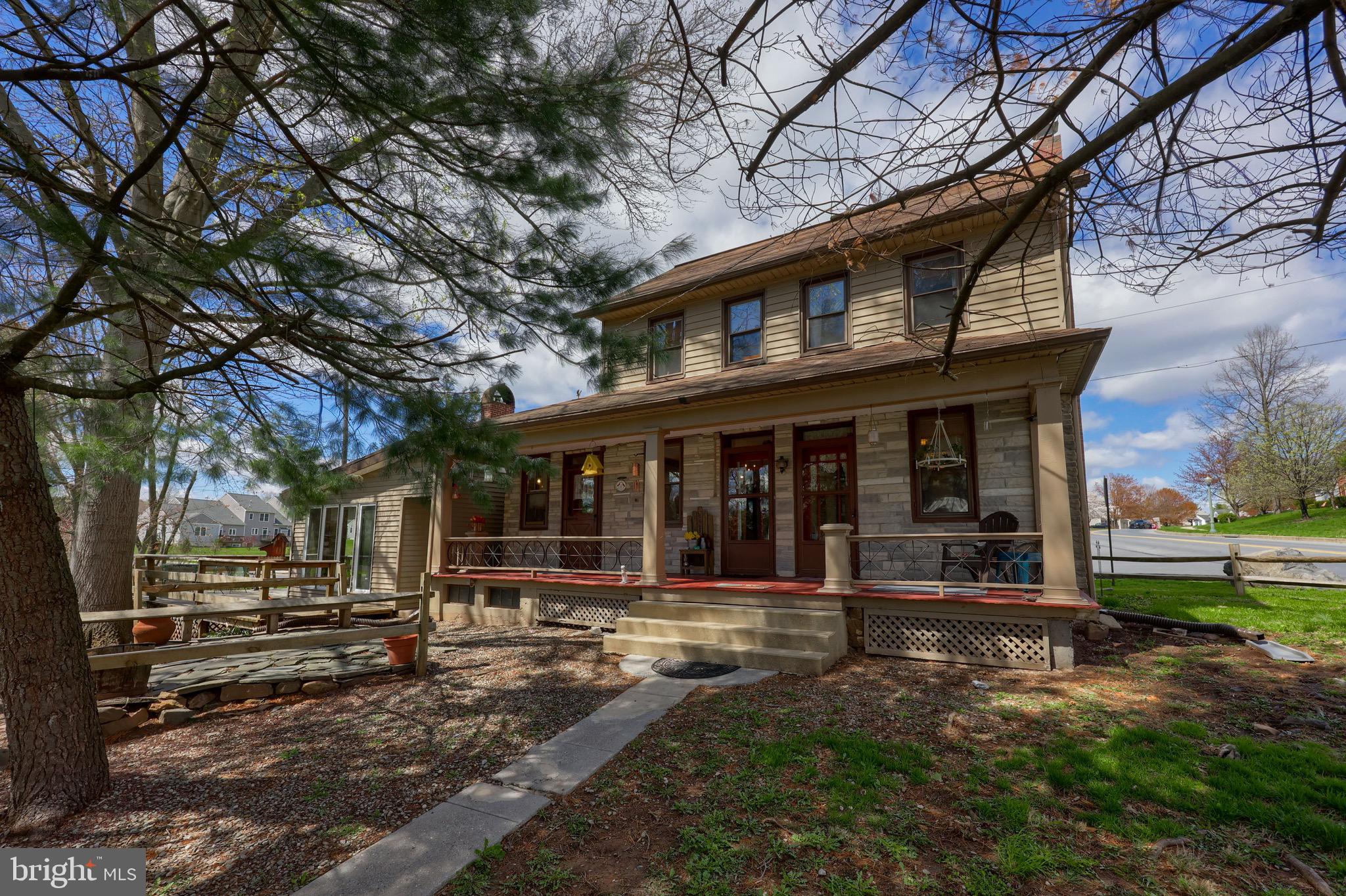 Welcome to your dream country escape! This cozy 2 Bedroom, 1 Bath farmhouse in Elizabethtown offers the perfect blend of rustic charm and modern comfort. Set on a beautifully landscaped property with a sprawling yard, serene creek, fire pit, garden, multiple sheds, a large barn, and a 2-car garage — this home is a rare find with endless possibilities.
Step inside to discover original log wood walls, rich hardwood floors, fresh paint, and an open-concept kitchen and dining room perfect for entertaining. The kitchen features a stunning quartz island, stainless steel appliances, a breakfast nook, and a cozy wood stove for added warmth and charm. Enjoy the comfort of two living rooms and a bright, inviting four seasons room ideal for relaxing year-round.
Upstairs you’ll find two spacious bedrooms, and the third floor boasts a generous attic space—ideal as a home office, playroom, or even a future third bedroom.
Outside, the wrap-around deck invites you to take in the scenic views and peaceful sounds of nature. Whether you’re gardening, hosting friends by the fire, or simply unwinding by the creek, this property is your private slice of paradise.
A perfect blend of character, space, and opportunity—this farmhouse is ready for its next chapter. Come see what makes this home truly special!