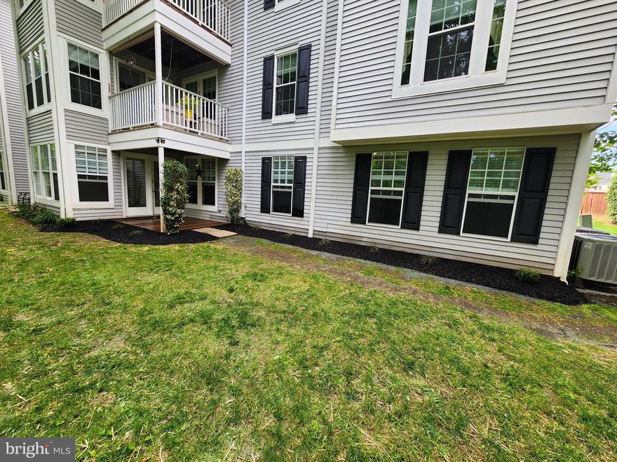 1st floor Rear unit you can enter from the patio, no steps. This unit has been completely updated through out! Owner has spared no expense: New LVP flooring through out, kitchen cabinets, stainless steel appliances, granite counters, bathroom tub, vanity and surround, toilet and fresh paint. Galley- style  kitchen with breakfast bar, tile backsplash and pantry. Sunroom/ Dining room  has windows that face the treed rear yard. Primary bedroom features two walk in closets. Full size washer and dryer. Plenty of parking with  one assigned spot.  This unit is move in ready! Nothing left for you to do but pack your bags!  Excellent location, minutes to downtown Bel Air. Don't miss this opportunity!