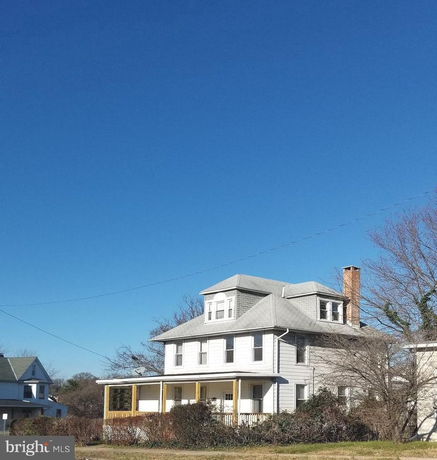 Spacious 4 bedroom colonial style home with covered front porch, rear deck, large corner lot, and 2 car garage ----------- Main level features an open design, a half bath, and an updated kitchen with island and stainless steel appliances; laundry room is on the main level ---------- Upper level features 3 bedrooms,  family bathroom, and the primary suite with its full bath and a walk-in closet --------- The third level loft features the fourth bedroom --------- The home has warm and soothing gas heat and cool and refreshing central air and two ceiling fans