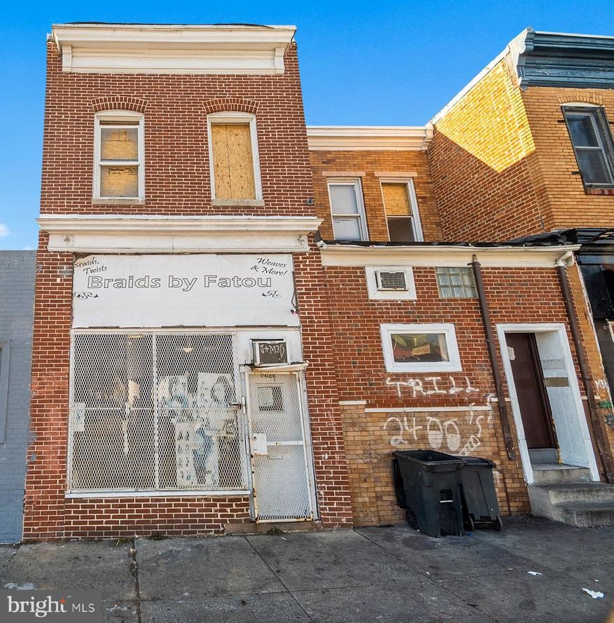 Great opportunity to purchase a mixed-use building in the desirable Barclay neighborhood of Baltimore City. This 4-unit property consists of 3 residential units and 1 commercial unit and offers strong value-add potential. Two units are currently rented, generating a Gross Annual Base Rent of $17,220, with a Potential Gross Annual Base Rent of $55,200 when fully occupied at market rents.
Unit 1 is a main-level residential unit featuring 1 bedroom, 1 bathroom, bonus room, living area, and kitchen, with access to the backyard. Scheduled rent is $850/month, and per seller, the tenant is current.
Unit 2 is an upper-level residential unit.
Unit 3 is a commercial barber shop on the main level with open space and a half bath, rented at $585/month, with a long-term tenant in place for approximately 20 years (per seller).
Unit 4 is an upper-level residential unit with 1 bedroom, 1 bathroom, living area, dining area, and kitchen, currently vacant. The unfinished lower level provides ample storage and houses a gas hot water heater, gas meter, 5 electric meters, and 3 electric panels. All tenants pay their own BGE, and each unit has baseboard heat (per seller). Property is Limited Lead Free and zoned C-1. Expenses: Owner pays water, insurance, property taxes, and repairs as needed.
Ideal opportunity for investors or owner-occupants seeking cash flow with significant upside.