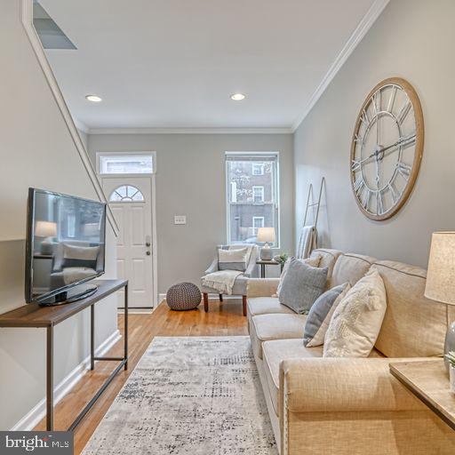 Come tour this stunning 3 Level, 3 bedroom/# Bathroom with plenty of luxury amenities and two living spaces. Enter into the foyer and be greeted with wood flooring, a cozy family room with a fireplace and a separate dining room. The kitchen features stainless steel appliances, granite countertops with an oversized pantry and plenty of cabinet space. The upper level offers 3 Large bedrooms, a hall bathroom a laundry room for your convenience, the owners suite has 2 walk-in closets, a private bath with two vanities, a corner soaking tub and a separate shower. The fully finished basement offers a spacious family room that's perfect for entertaining, a huge storage area and a full bathroom. Come enjoy the peaceful view and relax on the maintenance free composite deck that overlooks the backyard. This home is close to the community amenities, shopping, dining and entertainment.