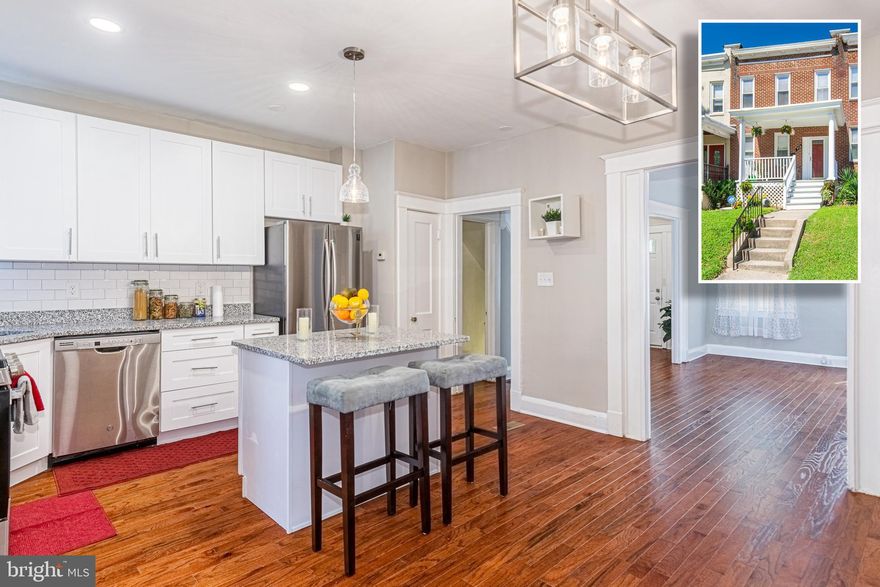 MOVE-IN READY PORCH FRONT ROWHOME THAT OFFERS THE PERFECT MIX OF CLASSIC CHARM & MODERN AMENITIES!  Over 1,500 sq. ft. of living space featuring hardwood floors throughout, an inviting living room, separate dining area, designer island kitchen with granite counters & ss appliances, main level laundry room, upper level with 3 bedrooms and 1 full bath, finished basement with a family room, 2nd full bath, and storage space, a rear fenced yard that's perfect for entertaining, and off street parking!  Perfectly located close to Johns Hopkins Homewood campus and Union Memorial Hospital!