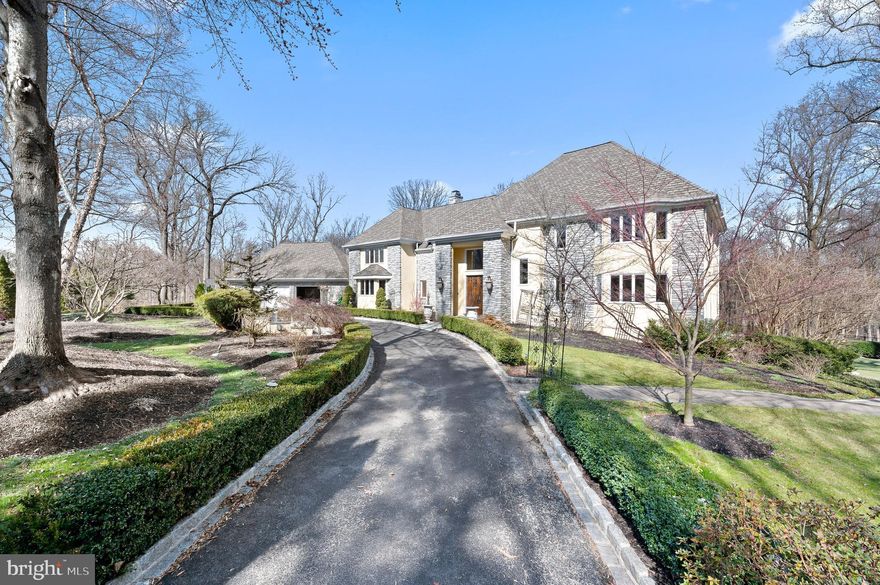 Welcome to 245 Maple Hill Road! This stunning European style estate nestled behind gates in the heart of Gladwyne is sure to impress. As you approach the property, you will immediately notice the grandeur of the architecture and the meticulous attention to detail in the design. When you enter the home, you will immediately notice the beautiful floors and unique molding throughout, adding to the home's character and elegance. The grand foyer sets the tone for the rest of the home and displays the stunning living room that features a marble fireplace and windows that warm the space with natural light. Next, you will find the the spacious formal dining room, with a double-sided wood burning fireplace that is shared with the family room. As you enter this remarkable room, you will immediately notice the impressive height of the ceilings, which soar overhead, giving the space a sense of opulence and spaciousness. The skylights allow natural light to flood the room, creating a warm and welcoming atmosphere. The family room is open to a gourmet kitchen, creating a seamless flow between the two spaces that is perfect for those who love to cook and entertain. The gourmet kitchen is a chef's dream, with high-end appliances, ample cabinet space, and a center island that is perfect for food prep. Directly off the kitchen is the spacious breakfast room that greets you with an abundance of natural light. The mudroom with a powder room off the 3-car garage ensures a tidy entry and exit. The luxurious first-floor bedroom with an ensuite bathroom and ample closet space provides convenience and privacy. A large office with built in bookshelves and an additional powder room complete the main floor. Additionally, enjoy the elegant back deck overlooking the pool and grounds, accessible from the family room, living room, and dining room. Upstairs, the second-floor primary suite is a truly special space, designed to provide comfort, luxury, and tranquility. As you enter, you will be immediately struck by the sophistication of the space. The expansive room boasts vaulted ceilings, a gas fireplace, and a very spacious walk-in closet. The walk-in closet is a true masterpiece, featuring custom built-ins that provide a perfect balance of functionality and aesthetics. The ensuite bathroom is equally impressive, with two sink vanities, a nicely sized glass-enclosed steam shower, and, for those days when you need to unwind, the jacuzzi tub is the perfect solution. The two additional second-floor bedrooms both include ensuite bathrooms and provide ample closet space. Downstairs, the basement is a true retreat, where you will find the ultimate space for entertainment and relaxation. The fully equipped bar is designed to impress and is the place to mix up your favorite drinks and serve them at the custom-built bar or take them outside to enjoy by the pool. The adjacent wine cellar is a wine enthusiast's dream. The home theater allows for an escape from reality with comfortable seating and high-end equipment. The basement also includes an additional bedroom with a full bathroom, providing the perfect accommodation for overnight stays. The back patio and pool area are accessible from the basement, providing a seamless transition between indoor and outdoor living. You can step outside and enjoy the warm sun and refreshing pool, all while staying close to the action of the home. The luxurious pool is the centerpiece of the outdoor area and is surrounded by a spacious deck. An outdoor shower provides the perfect way to rinse off after a dip in the pool. Overall, this stunning estate in Gladwyne offers luxury, comfort, and elegance in every detail, while in a prime location, not far from Center City or all that the Main Line has to offer.