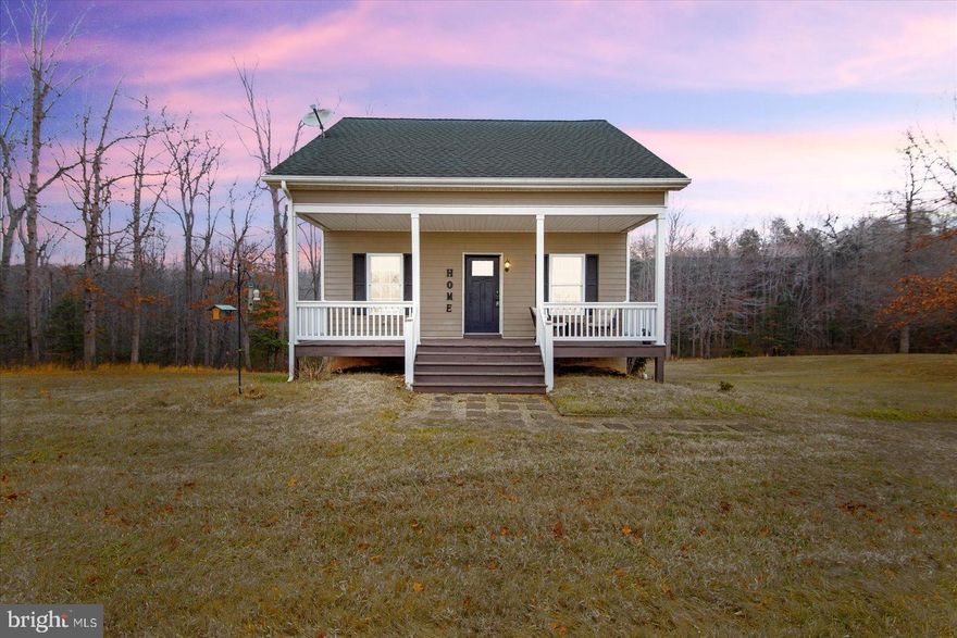 Peaceful Country Living on 2 Acres! This beautiful, almost 1,700 sq. ft. home offers three levels of finished living space in a picturesque setting. On the main level, you'll find the primary bedroom, a full bath, and a kitchen with a breakfast bar opening to the living areas, with pasture views. Upstairs, there are two bedrooms, a full bath, and a convenient laundry room.  The finished lower level includes a recreation room, additional full bath, and a flex room perfect for a guest NTC bedroom or office. Enjoy outdoor entertaining on the expansive front porch, rear deck, or patio. Minutes from Lake Anna and centrally located between Fredericksburg, Culpeper, and Orange. Come see the views for yourself—this pastoral beauty won't last long!