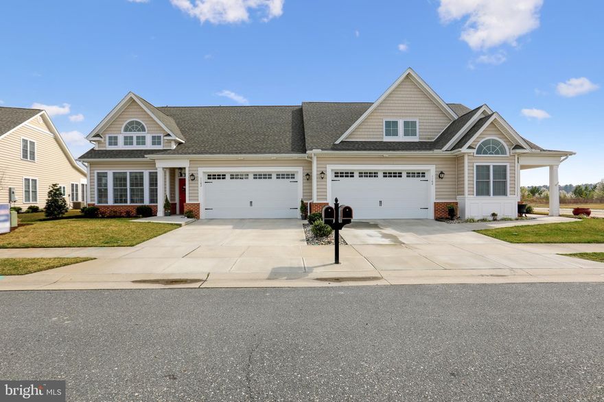 Located in Summers Gate, a centrally located 55+ community with amenities that include a clubhouse with heated outdoor pool, event space, library and fitness center, this meticulously maintained, 3 bedroom, 3.5 bath custom built duplex unit is just the place to call home! Built in 2018, the home offers an open floor plan with generous interior living space that includes dramatic vaulted ceilings, custom bookcases, gas fireplace, luxury vinyl  wood  flooring, an upscale kitchen that would please any cook, a spacious 1st floor master suite, another 1st floor bedroom w/ private bath, a loft that is the perfect spot for a home office, studio or hobby area, a bonus room ideal for climate controlled storage, as well as a screened porch and 2 car garage. HOA fee also includes irrigation, lawn maintenance (mowing, mulching, shrubbery trimming) and snow removal.