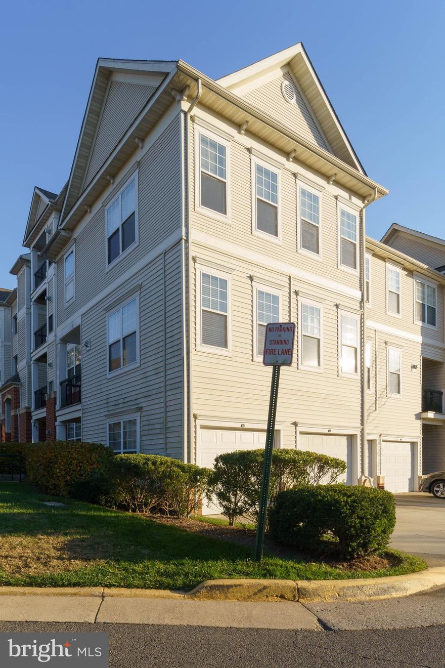 This 3 level 2 BR 2BA condo WITH an attached garage in Fair Oaks area.  This condo is convenient to transportation, I66, US 29, US 50, 5 miles to Vienna Metro and 12 miles to Dulles. Shopping is close by, Fair Oaks Mall, and many more. Unit faces south and is bright and sunny. Gas log fireplace and private balcony are other nice touches. On the main level are the kitchen combo living and dining area .  Kitchen with granite counter top with ss appliances . Upstairs are two BR and two BA. Master BA is off of Master BR. One garage space plus one driveway space.