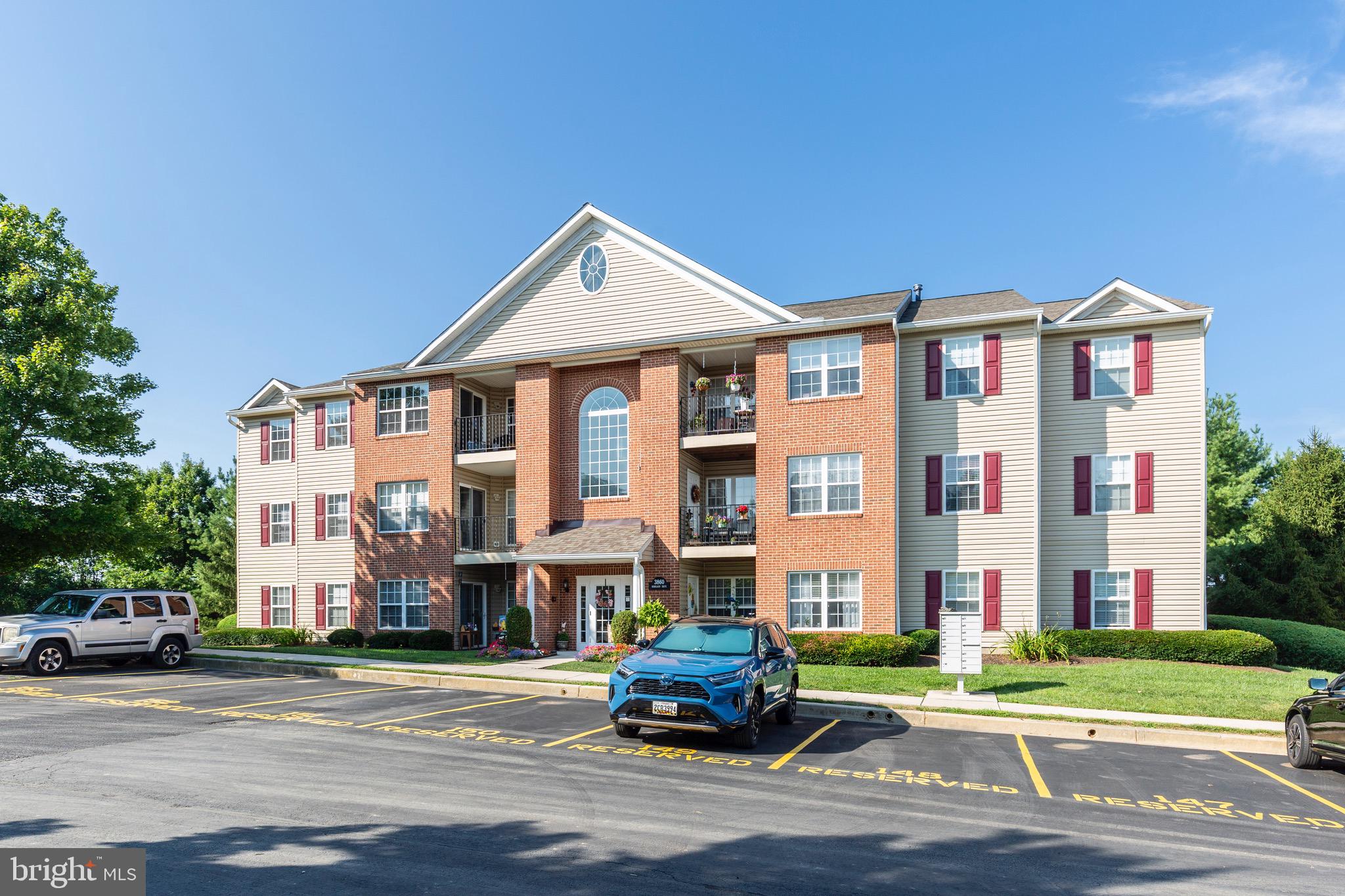 Looking for easy living with a touch of sunshine? This 2-bedroom, 2-bath condo has it all — including a bonus den and a cheerful sunroom perfect for morning coffee or unwinding after a long day. Located on the main floor, you can walk right in with no stairs to climb! In-unit laundry, an open layout, and flexible spaces make this home as functional as it is inviting. Move-in ready and waiting for you!