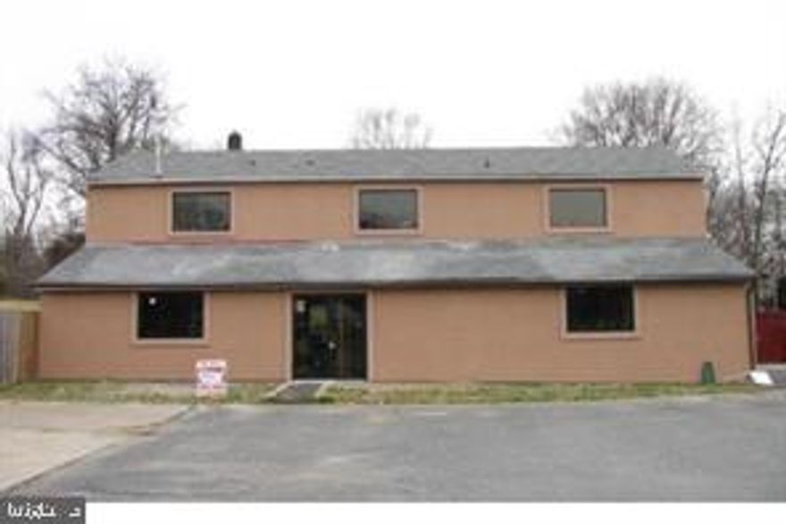 Commercial property zoned B-1, General Business with high visibility from Rt. 1. Entrance is off Triangle Street. Sale includes Lot 33A which is a double lot with a 4080 sq ft (60x34) building connected to county water and sewer.  Adjoining lots 37 & 39 are also included in the sale for a total acreage of .83 acres.  See plat in documents.  Additional addresses are 18606 and 18604 Triangle Street. Close to I-95, Quantico Main Gare and new Rosie's Casino just up the road.  Located in a developing area with many new townhomes and apartments.  Possible mixed retail/residential use.  Prime location ready for development!