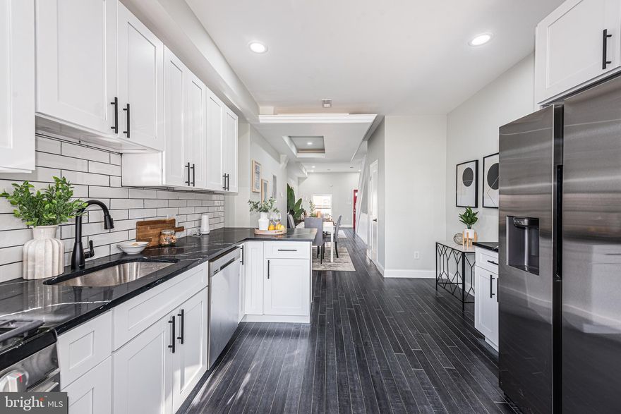 Live in Luxury! The builder left no stone unturned on this one! Walk into this brand new renovation and feel right at home! The upstairs features 2 bedrooms and 2 full bathrooms! On the main floor you will fall in love with the open layout living and dining areas a half bath plus the designer kitchen featuring an abundance of cabinet and countertop space with high end appliances and quartz counters! Downstairs there is a fully finished basement with a bedroom and bathroom.  Enjoy the walkout out deck and fenced in backyard! Schedule your tour today, this one will not last long!