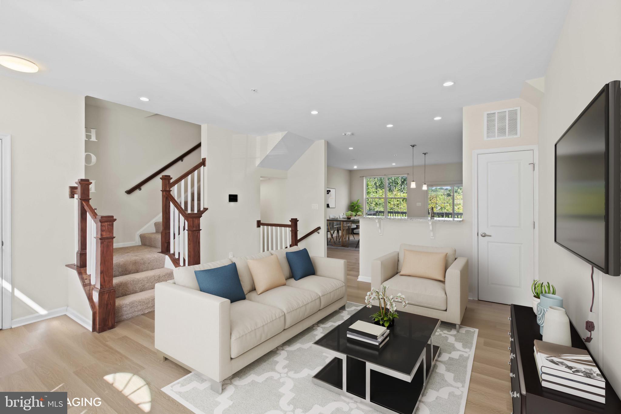 Welcome to 748 Maury Ave! This luxurious and spacious 4-bedroom, 3.5-bath townhome located in the new sought-after Columbia Run Townhomes Community. This prime location offers the best of suburban tranquility and city conveniences. It is minutes from the vibrant National Harbor waterfront, home to MGM Casino, Tanger Outlets, world-class dining, and entertainment. Enjoy the extended footprint with an open and inviting floor plan with 2,400 total square feet, designed for modern living and entertaining.
The main level features a sun-filled living area with beautiful luxury vinyl floors, recessed lighting and an open kitchen with a center island, stainless steel appliances, and a gas range. A newly added large deck off the kitchen is perfect for outdoor dining and relaxing. Upstairs, the private master suite is a true retreat, offering a vaulted ceiling, walk-in closet, and a spa-like ensuite bath. Two additional generously sized bedrooms, a full bath complete the upper level, along with a convenient laundry room.
The fully finished lower level provides a small office studio and an additional bedroom suite with its own full bath, ideal for guests, a home gym or as a private office. Residents of this community enjoy the benefits of a low monthly HOA fee that covers the landscaping and common area maintenance. Seller will provide closing help. 1 year home warranty included. Off-street parking is also included.