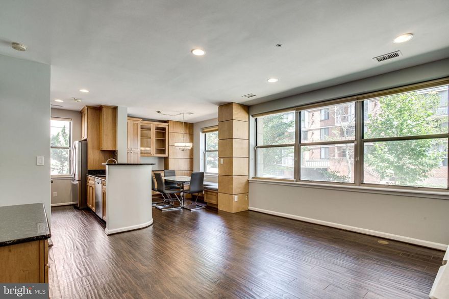 Gorgeous, completely renovated unit available now! Steps to Braddock Metro! Wood look tile floors and custom cabinetry throughout! Beautiful, custom glass table and built in seating. Wall of windows in main living area with custom blinds that can be raised up or lowered! Beautiful and spacious master bath with dual vanity and custom tile, walk in closet. Private access to second full bath from additional bedroom. One assigned, covered garage spot and one assigned surface parking spot. This is a highly walkable area to Old Town Alexandria and minutes to Reagan National and DC.