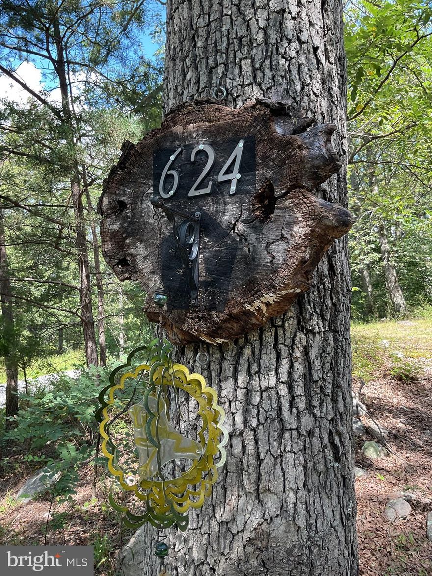 Here’s the one you’ve been waiting for. Well maintained 3BR 2 bath ranch in quiet subdivision. 2 additional parcels for a total of 7.68 acres.  This property is ideal for those seeking comfort, privacy and opportunity.  
Out in the country, but just 27 miles to Winchester and 16 miles to Capon Bridge. 
The land is wonderfully walkable, dotted with unique rock formations and features an additional septic and electric setup- perfect for a family compound, guest sites, or even potential income from campsites. Whether you’re looking for a full time residence, vacation retreat, or an investment in outdoor living, this property delivers it all. 
Contact listing agent today for videos and a closer look at this special property.