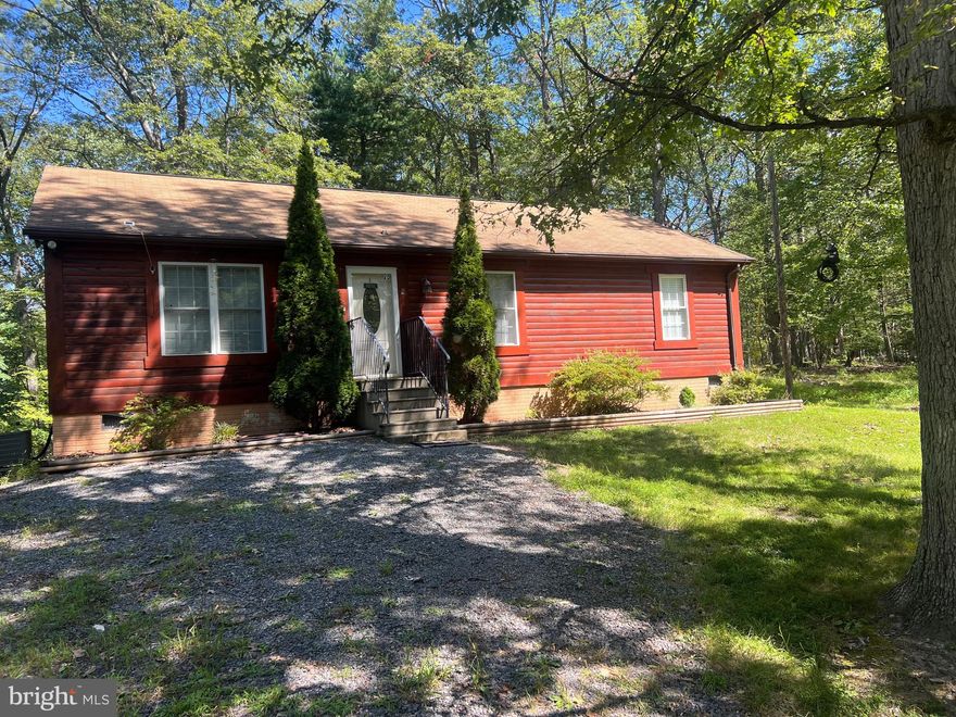 Here’s the one you’ve been waiting for. Well maintained 3BR 2 bath ranch in quiet subdivision. 2 additional parcels for a total of 7.68 acres.  This property is ideal for those seeking comfort, privacy and opportunity.  
Out in the country, but just 27 miles to Winchester and 16 miles to Capon Bridge. 
The land is wonderfully walkable, dotted with unique rock formations and features an additional septic and electric setup- perfect for a family compound, guest sites, or even potential income from campsites. Whether you’re looking for a full time residence, vacation retreat, or an investment in outdoor living, this property delivers it all. 
Contact listing agent today for videos and a closer look at this special property.