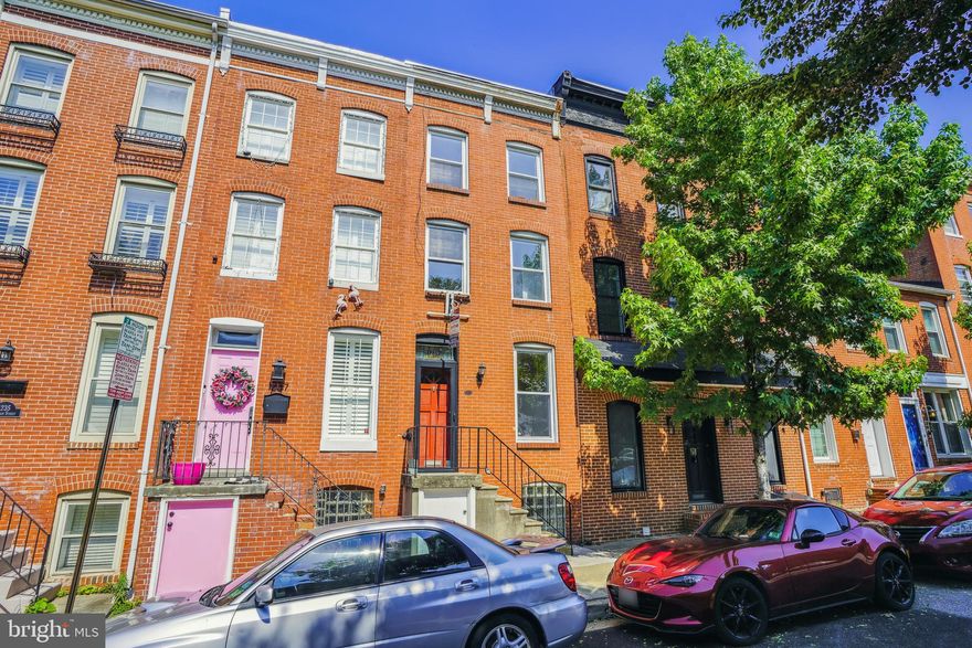 Back on the market with a  $25K in repairs and upgrades including a brand new massive deck and new upper and lower roof. A fantastic starter home in an ideal location WITH 2 CAR PARKING. This home has 3 legal bedrooms - finished lower level has an egress and a full bath.  Third floor has a bedroom and large office or den space. Great set up for room mates or potential investment opportunity.