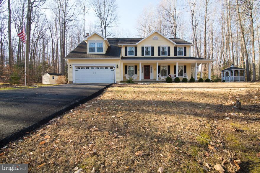 Stunning SFH Situated on 5 acres in a cul-de-sac, surrounded by trees, This home shows like a model top to bottom! Updated kitchen and baths new vinyl siding replacement windows. 5 bedrooms & 4 full baths, beautiful master suite with luxury bath. Solid oak wood floors on main level, fully finished basement with full bath & possible 6th bedroom/office area. Nothing left but to move in and enjoy!!